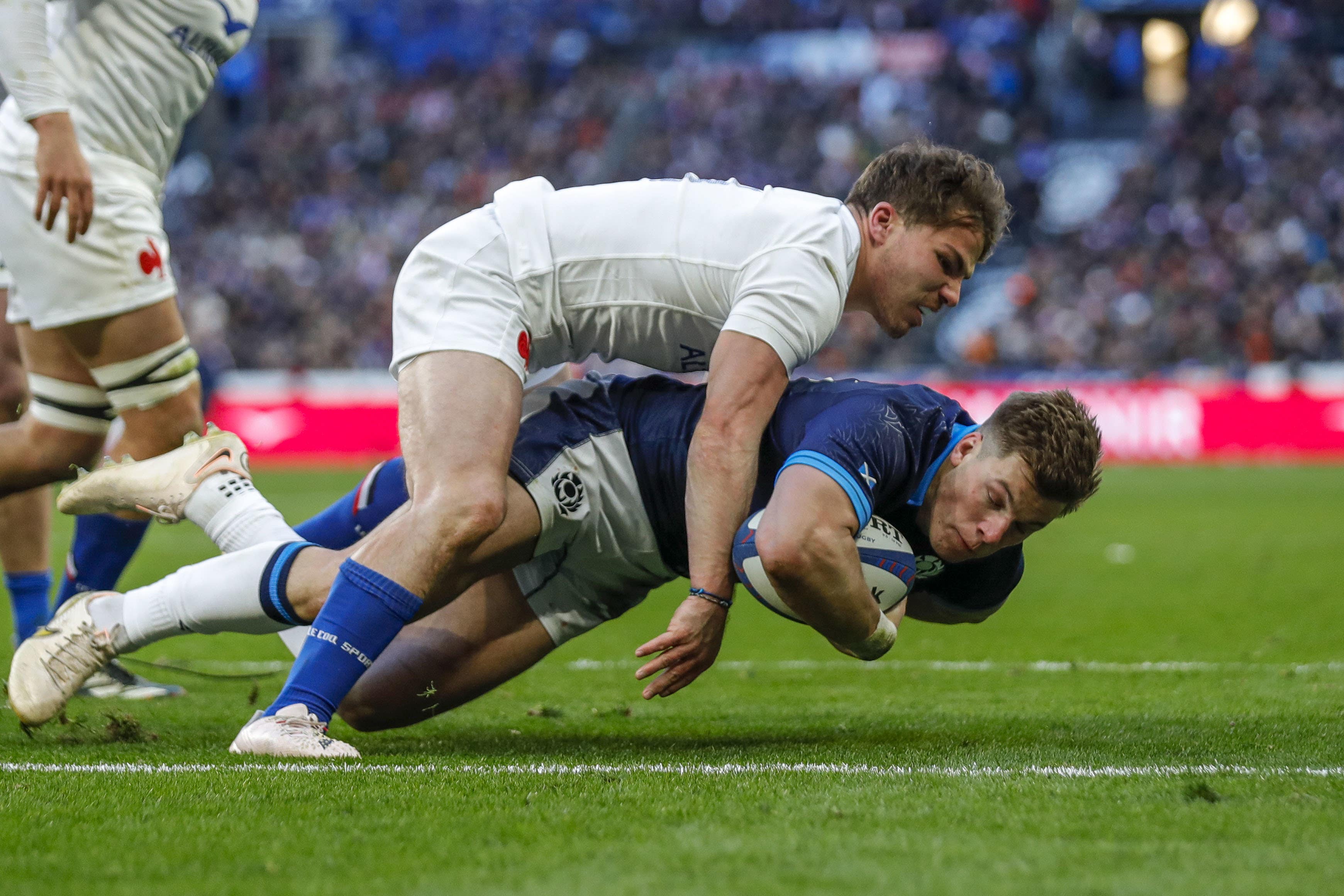 Huw Jones scored two tries in Paris (Ben Whitley/PA)