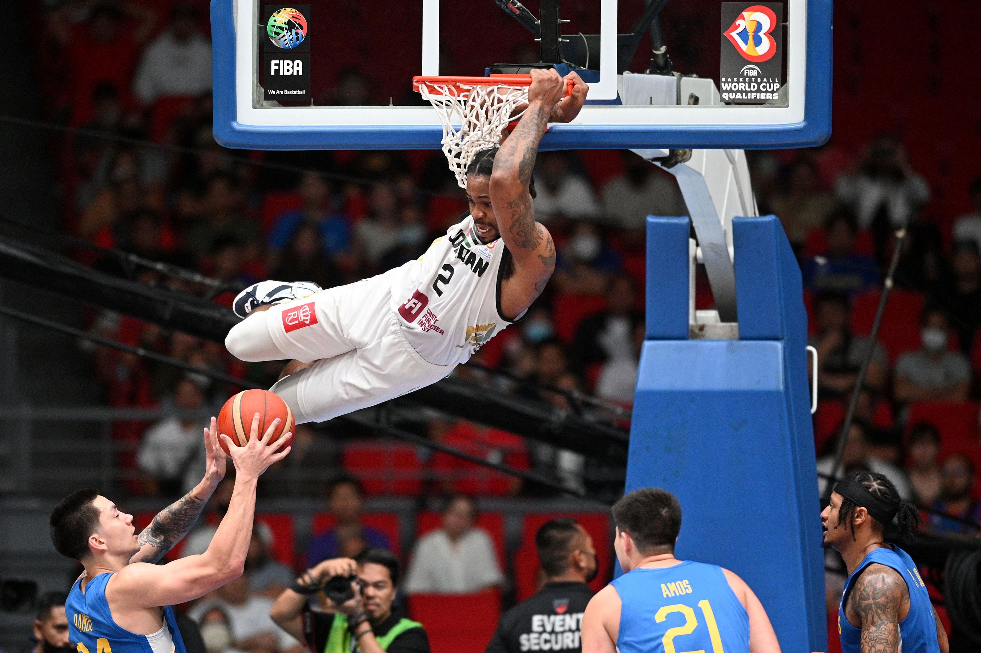 Jordan's Dar Tucker dunks the ball during the FIBA World Cup Asian Qualifier basketball match against the Philippines at the Philippine Arena in Bocaue town, Bulacan province north of Manila