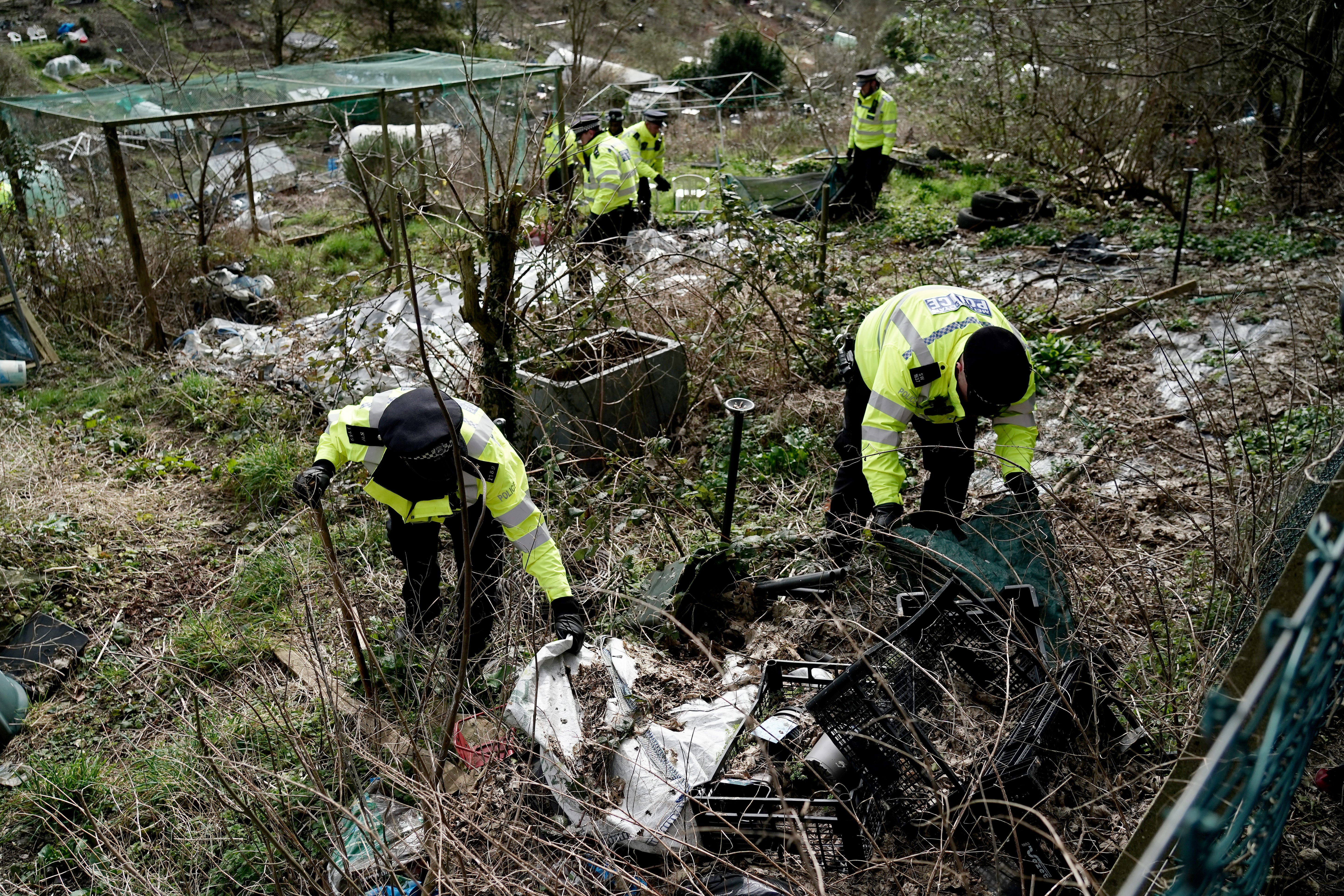 Police are searching allotments for the couple’s missing baby