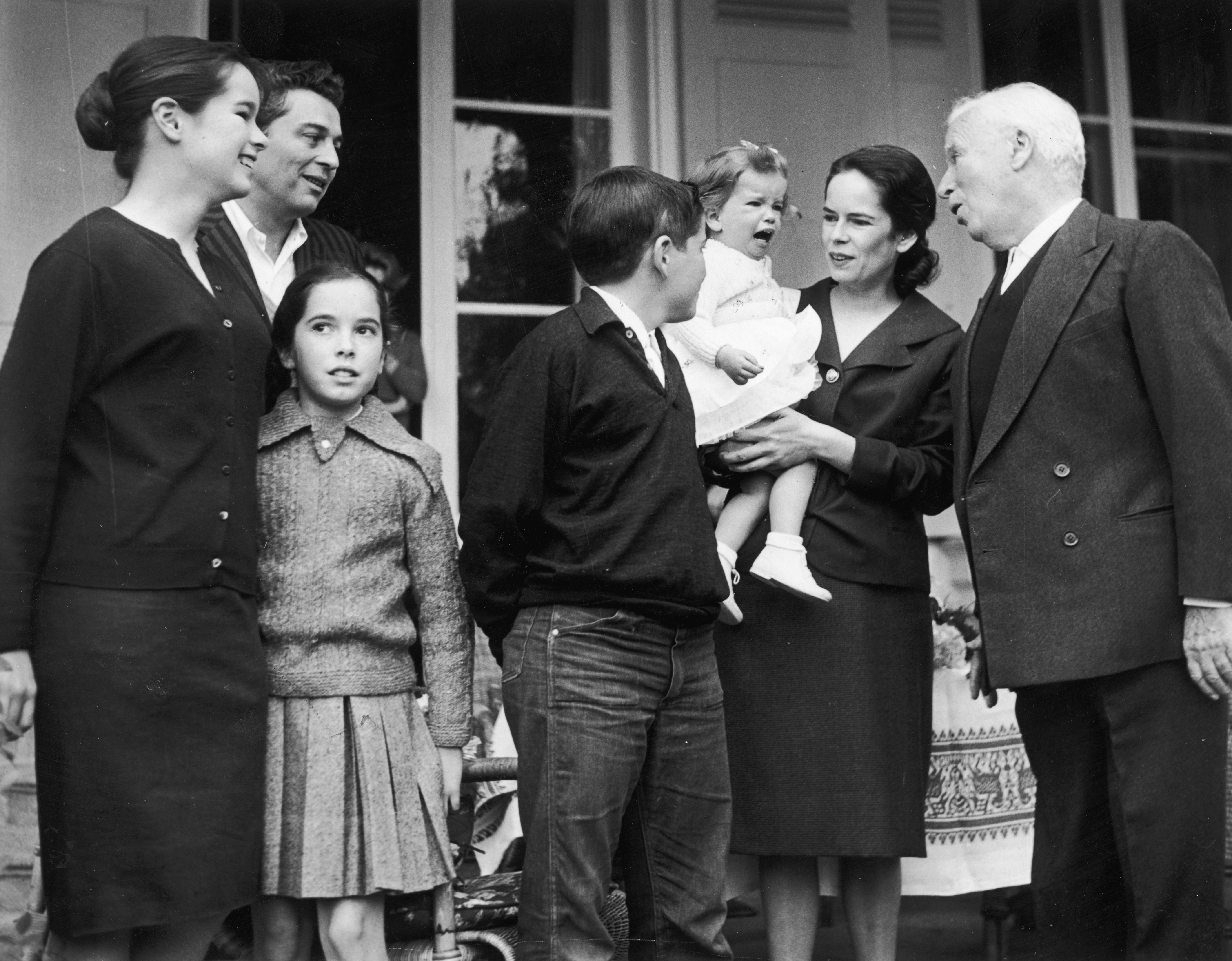 Charlie Chaplin (right) and his wife Oona O’Neill (second from right), with their children Geraldine, Sydney, Josephine, Michael, and Jane (left to right)