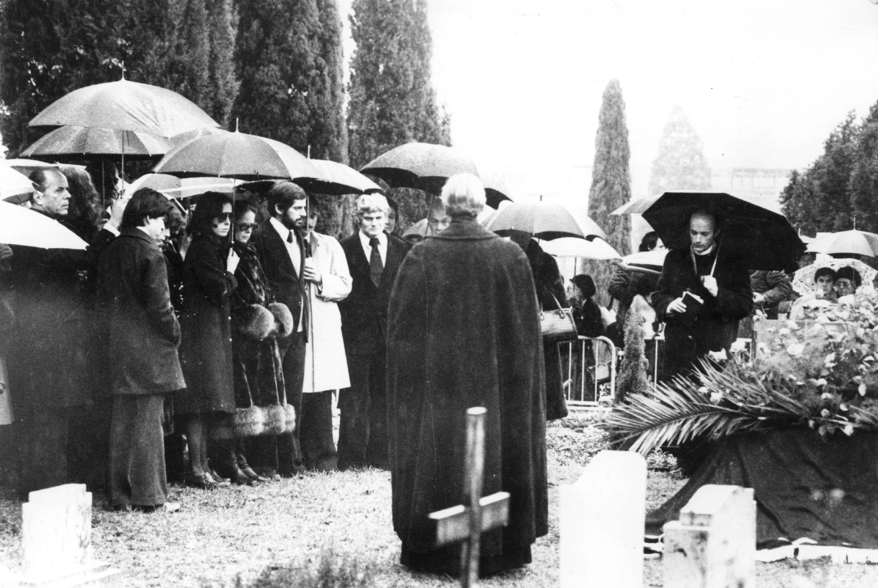 Charlie Chaplin’s family attend his funeral on 30 December 1977 in the cemetery at Corsier-sur-Vevey, near Lake Geneva