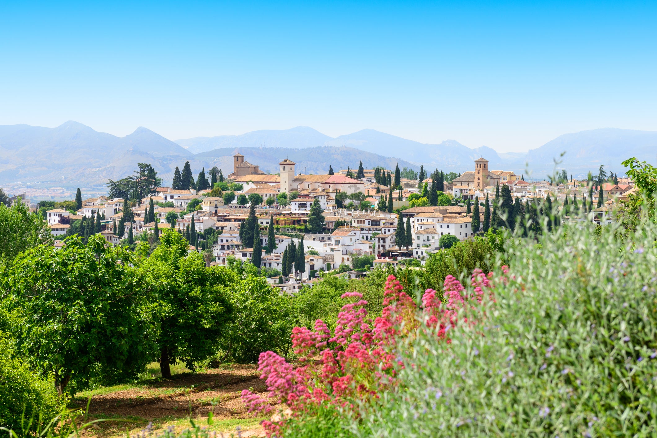 The Spanish city has one of the most spectacular locations in Europe, filling a valley in the Sierra Nevada