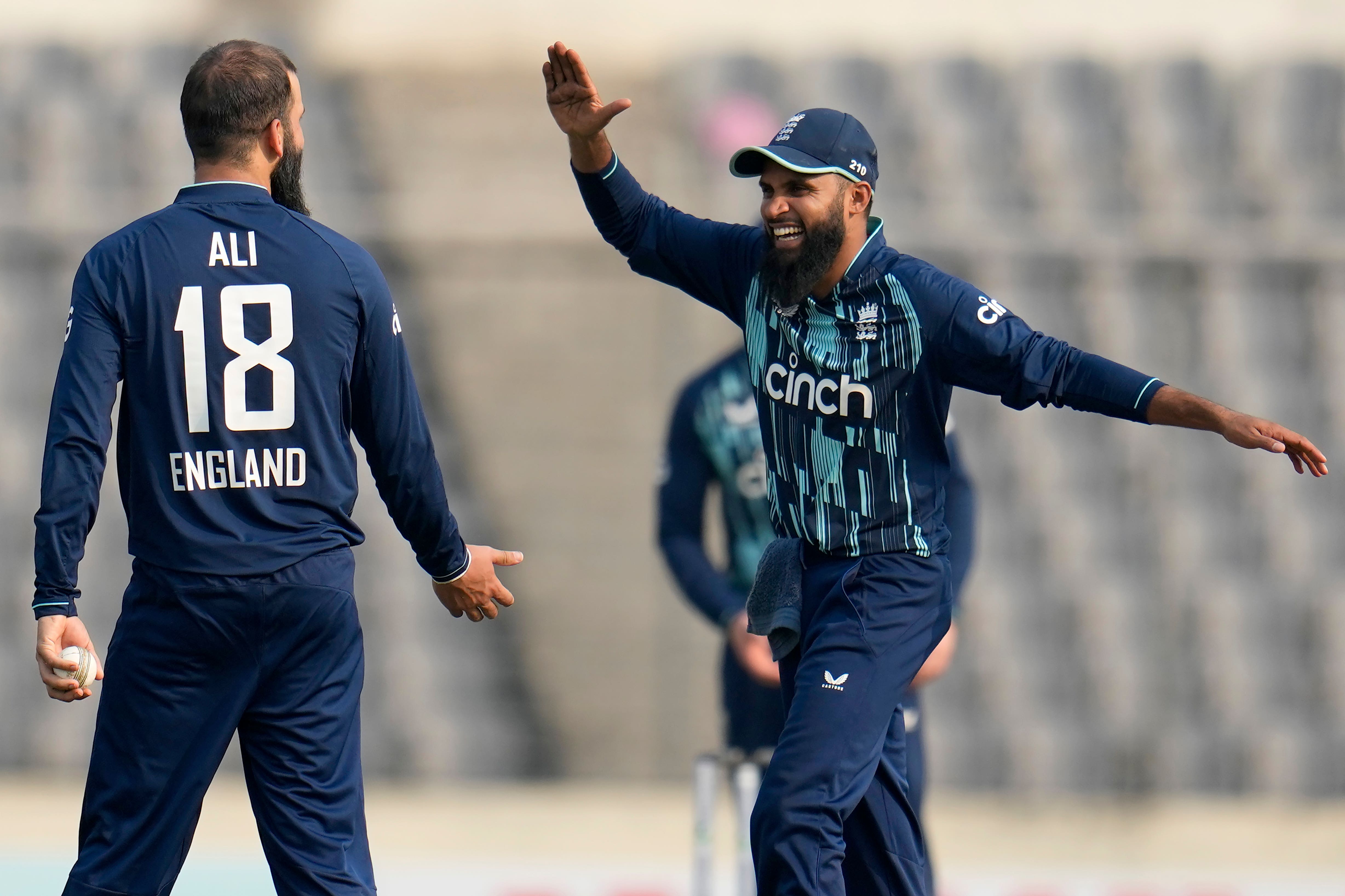 Moeen Ali (left) celebrates with Adil Rashid during England’s ODI in Bangladesh (Aijaz Rahi/AP)