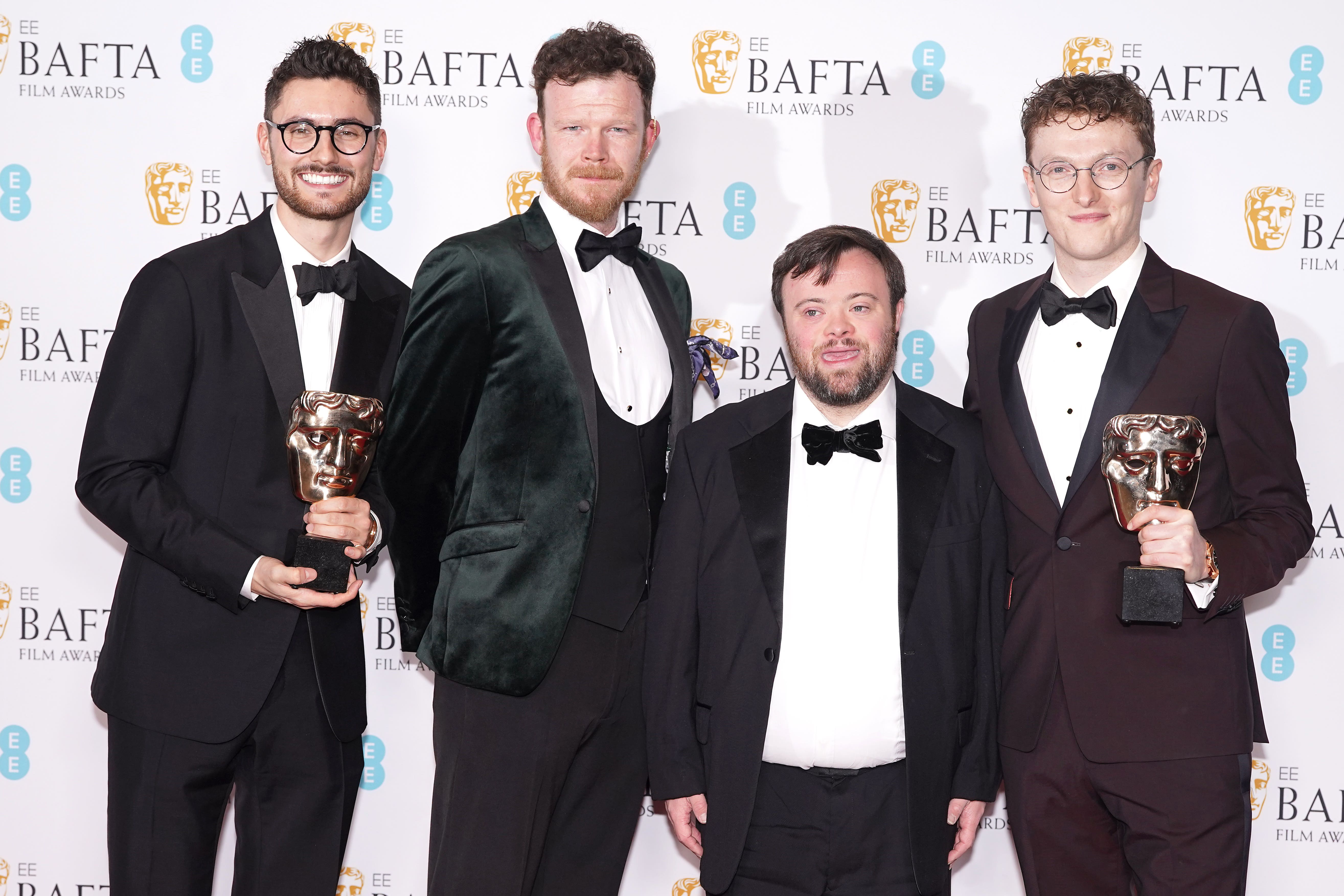 Tom Berkeley, Seamus O’Hara, James Martin and Ross White with their award for An Irish Goodbye (Ian West/PA)