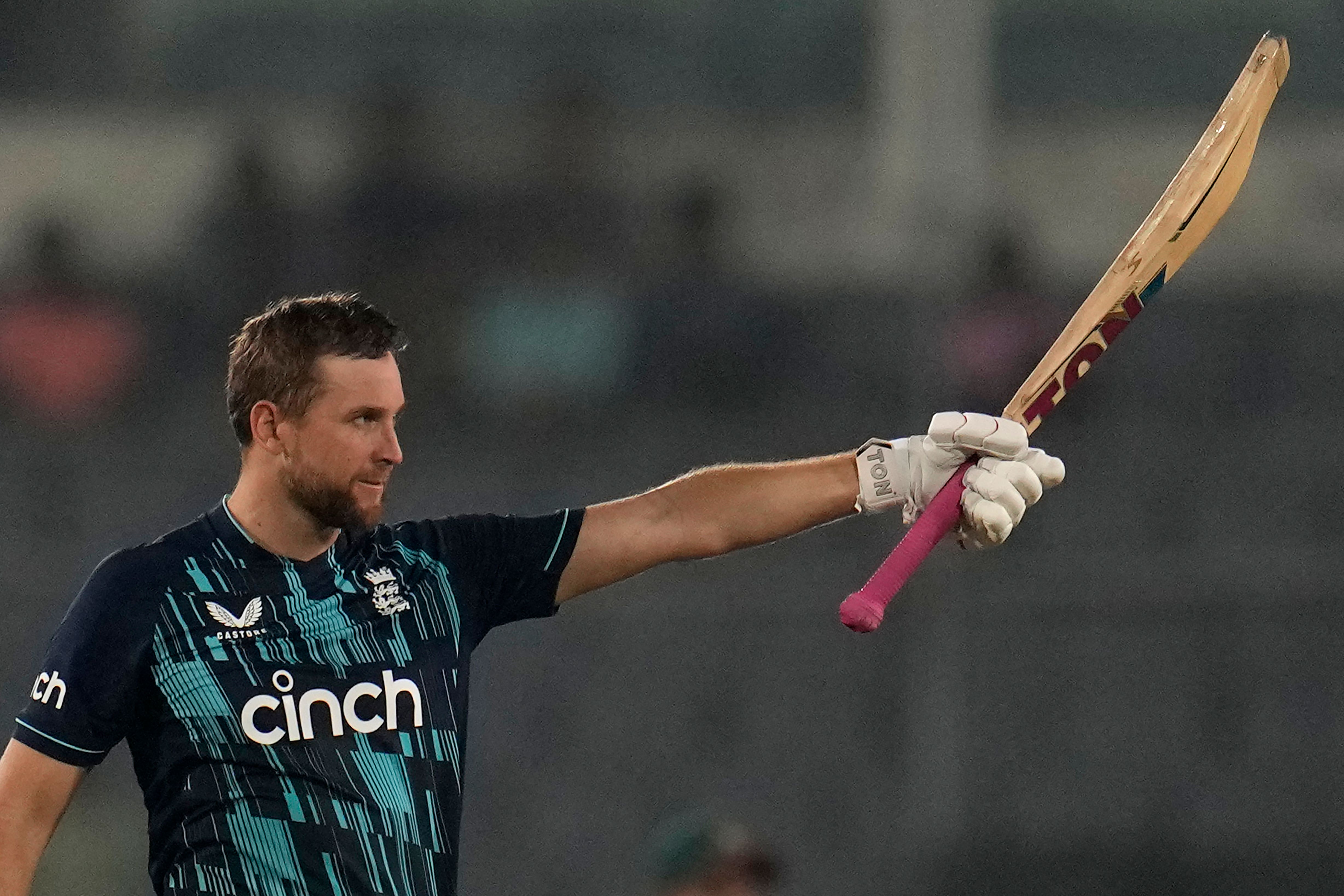 England’s Dawid Malan celebrates his century (Aijaz Rahi/AP).