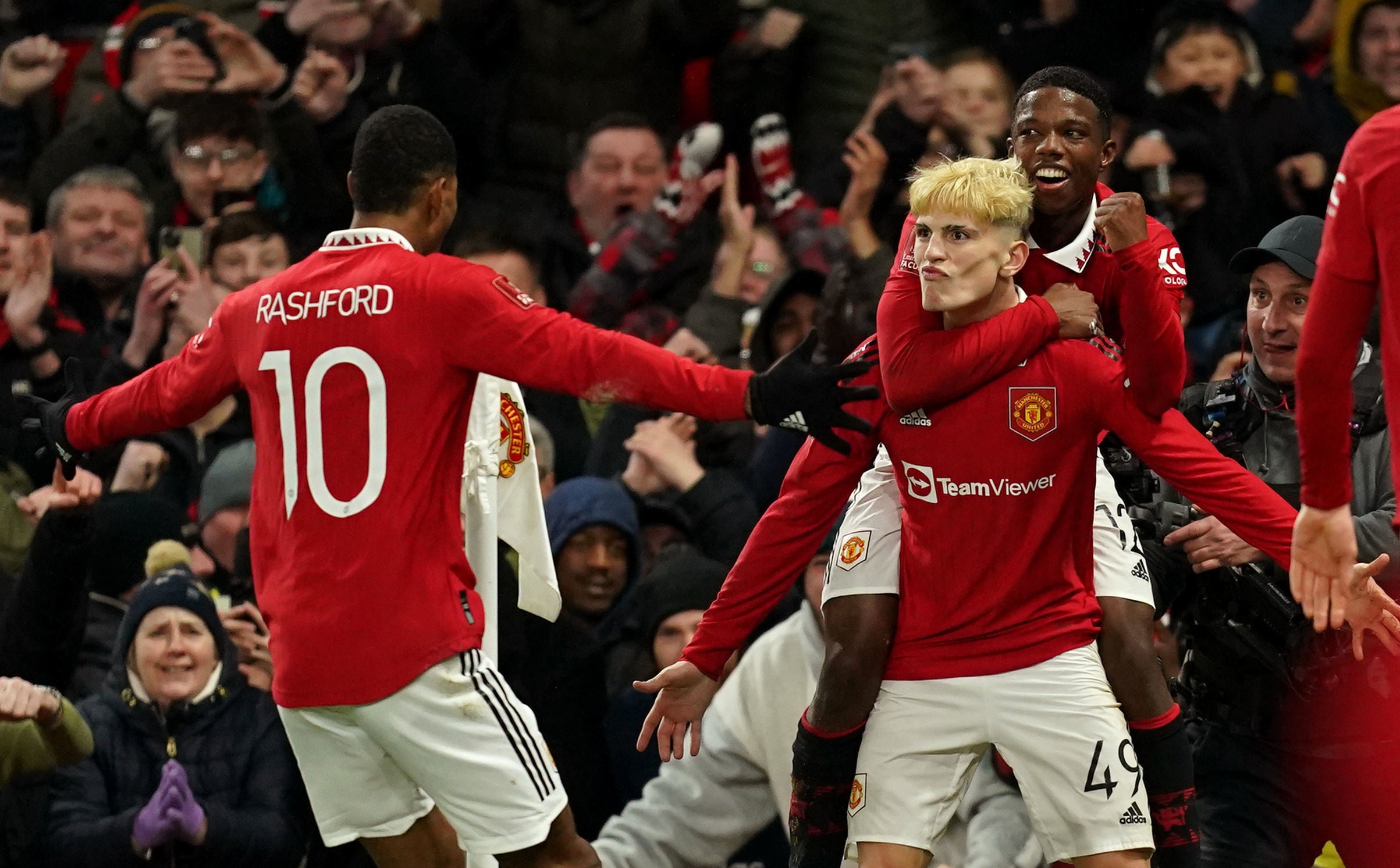 Man Utd dig deep to keep cup treble dreams alive