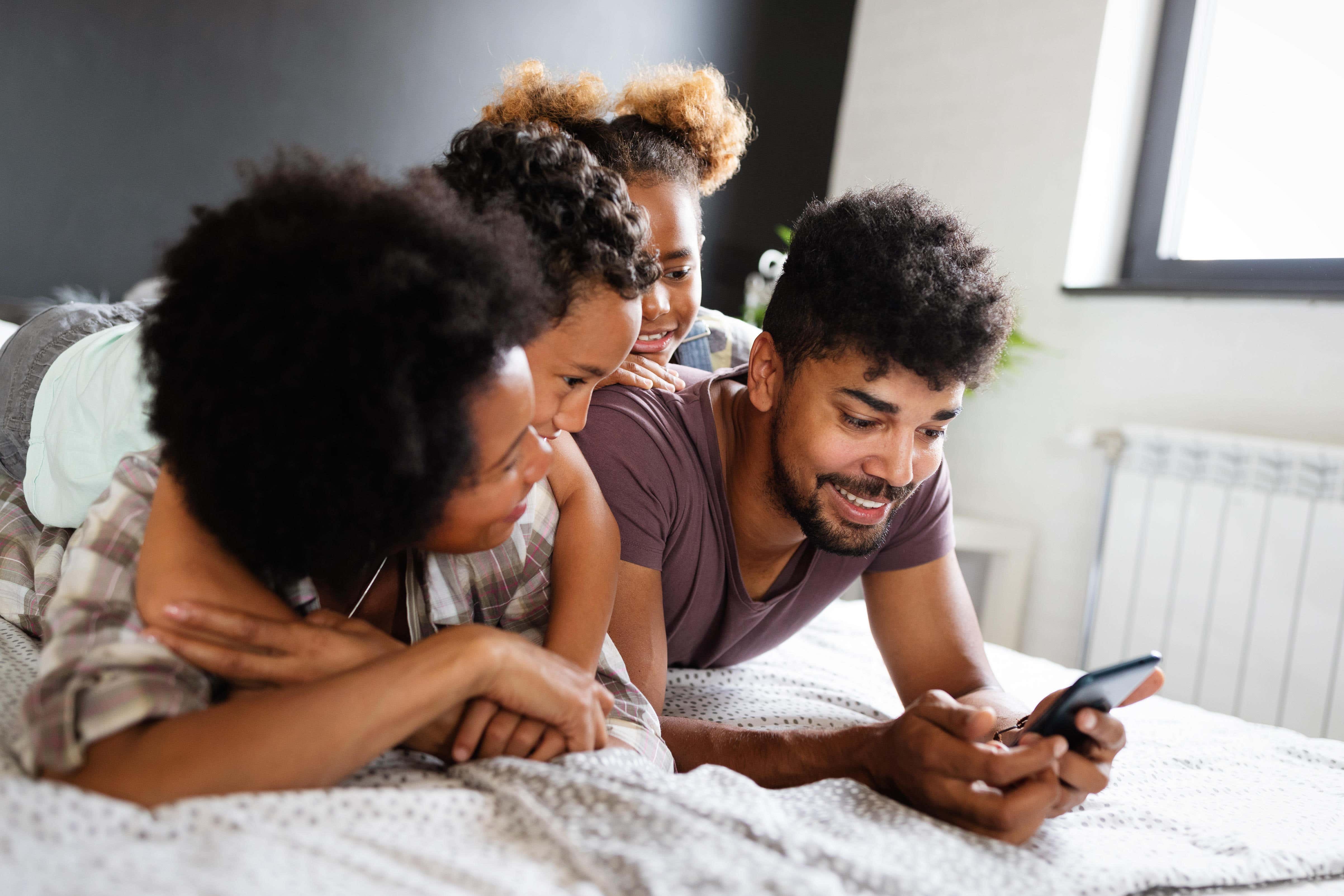 Children could help parents gain a better understanding of the internet (Alamy/PA)