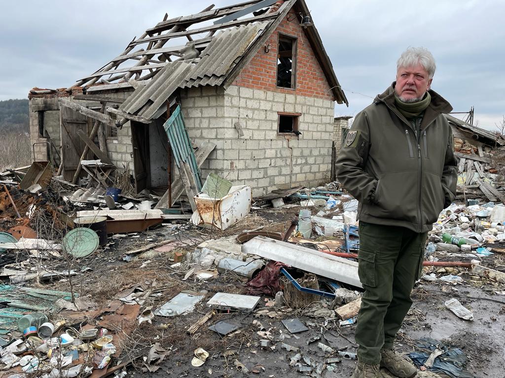 Maj Osadchy at the ruins of his mother’s house