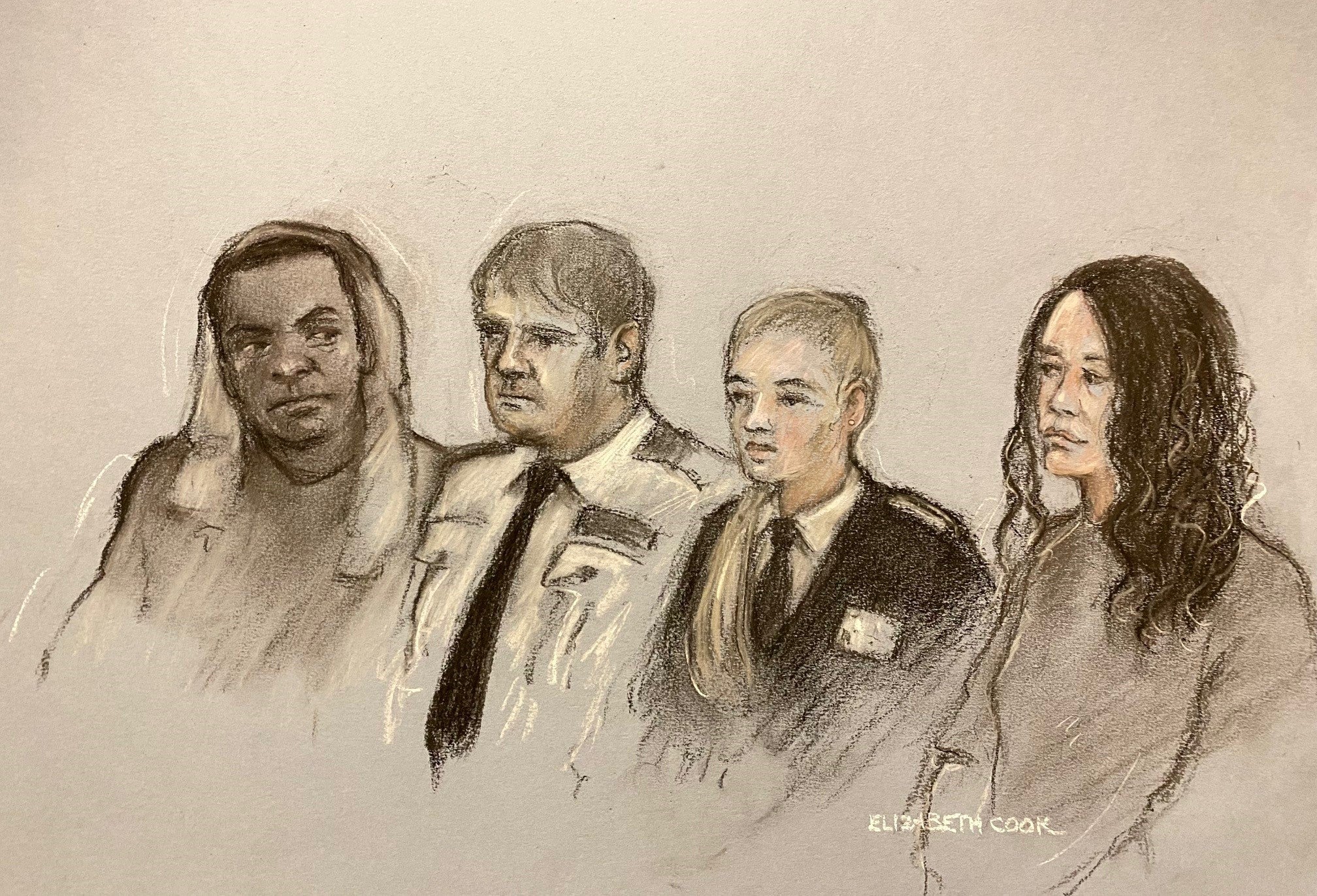 Mark Gordon and Constance Marten in the dock in court separated by two security officers