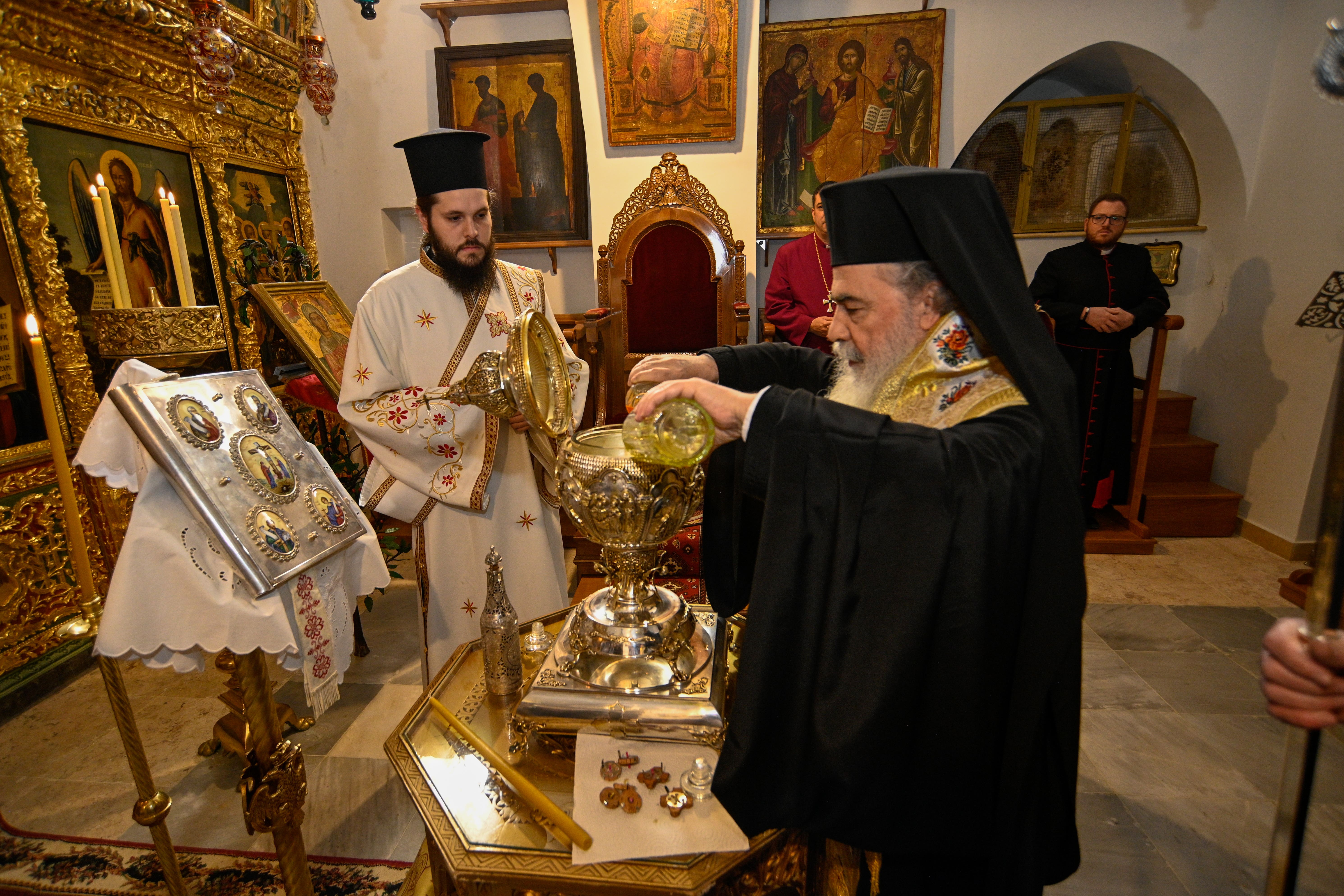 Oils from the Mount of Olives being mixed with essential oils and blessed in Jerusalem by the Patriarch of Jerusalem, His Beatitude Patriarch Theophilos III, to become Chrism Oil, which will be used in the coronation of King Charles (Patriarchate of Jerusalem/Buckingham Palace/PA)