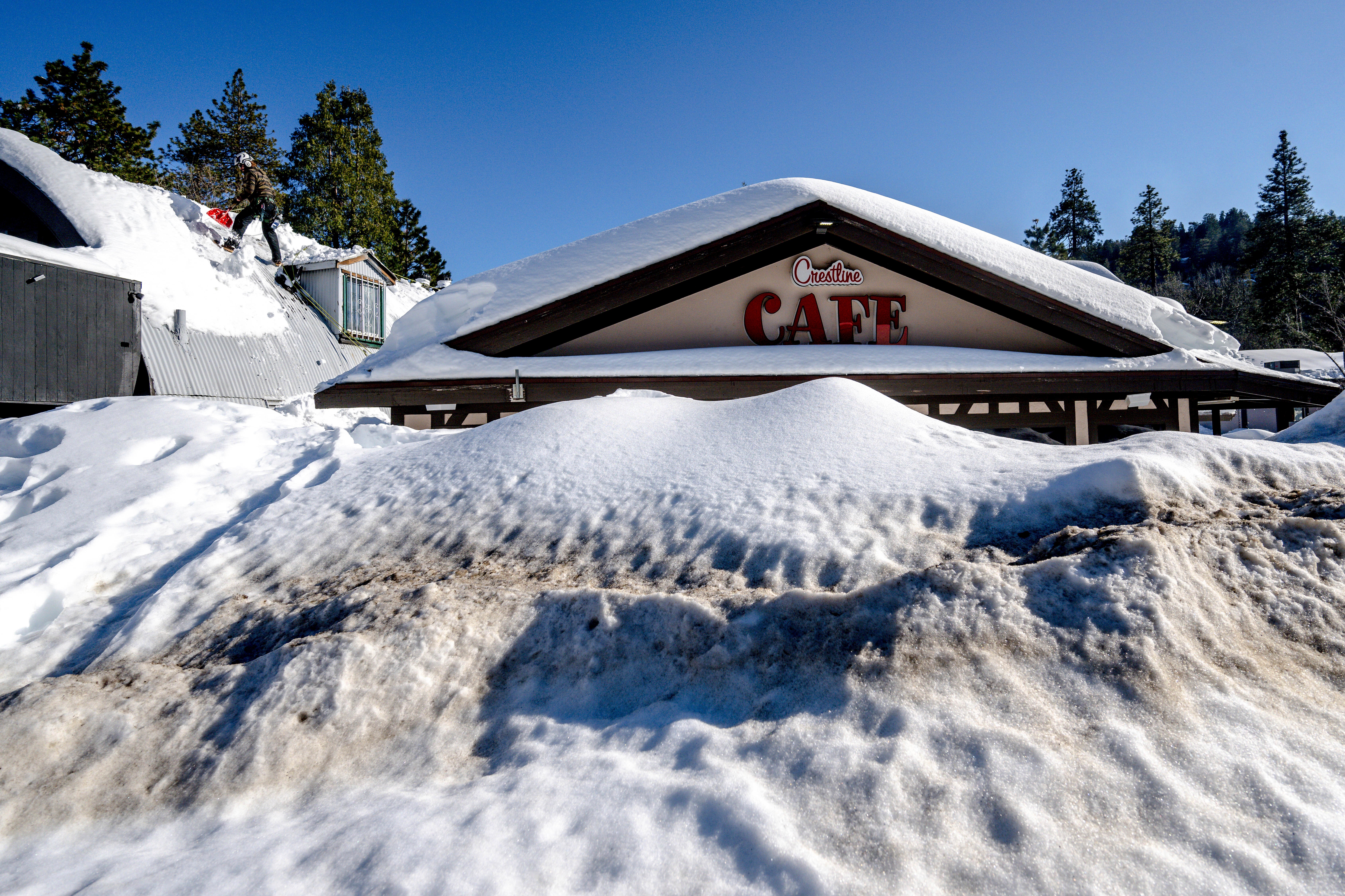 Inside the California mountain towns cut off by historic snowfall: ‘The damage is staggering’