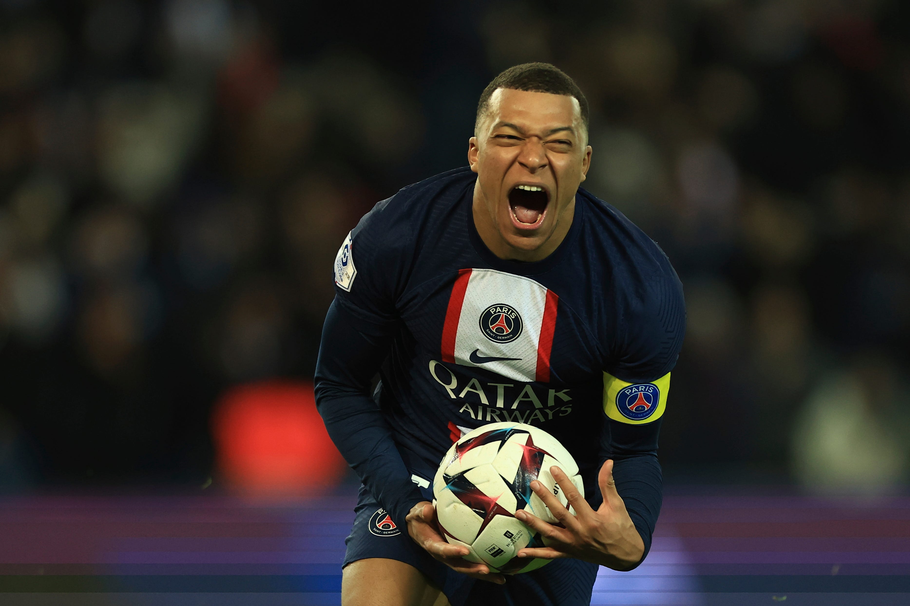 Kylian Mbappe celebrates his landmark goal (Aurelien Morissard/AP)