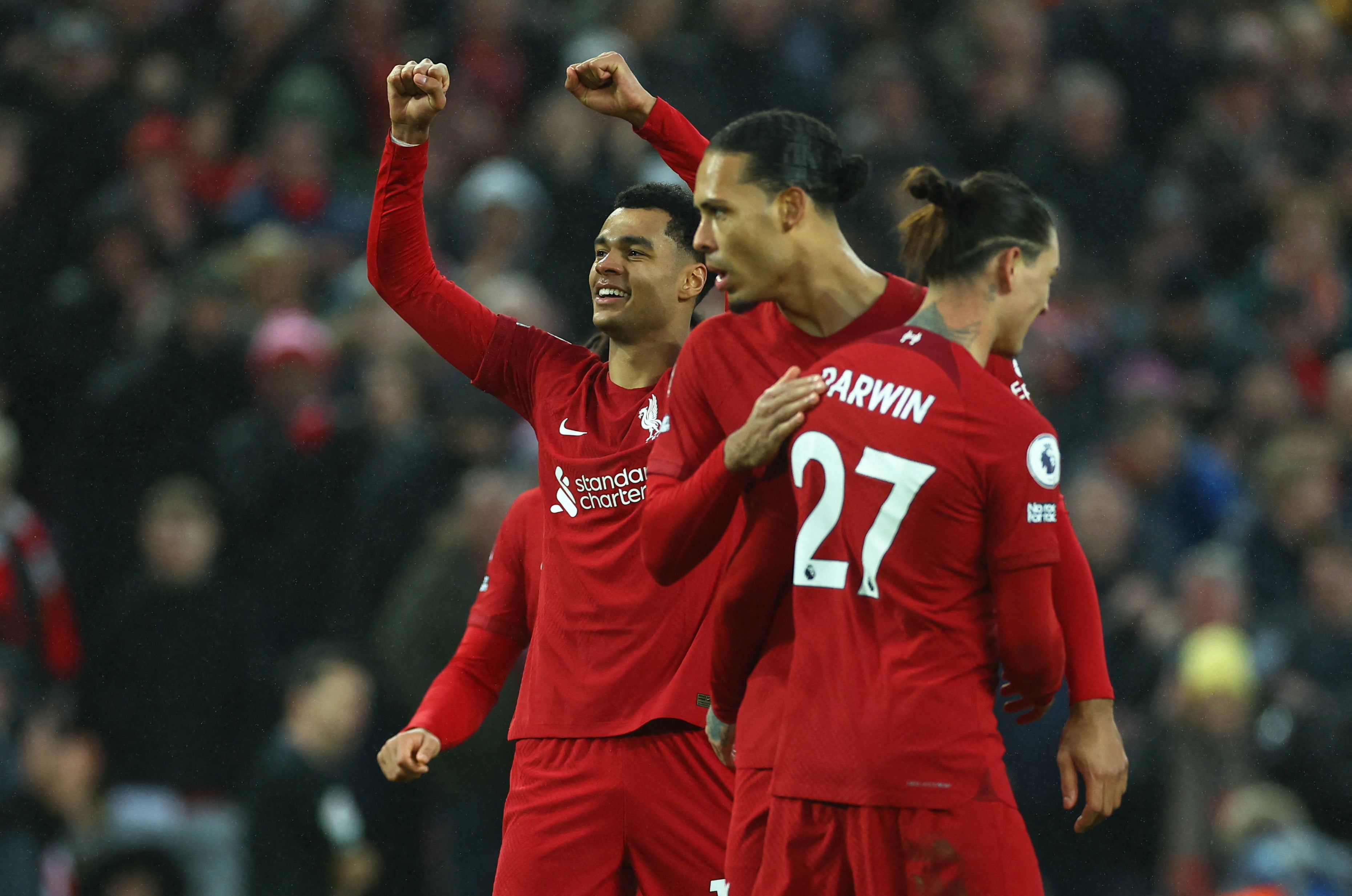 Cody Gakpo raises his arms after scoring for Liverpool