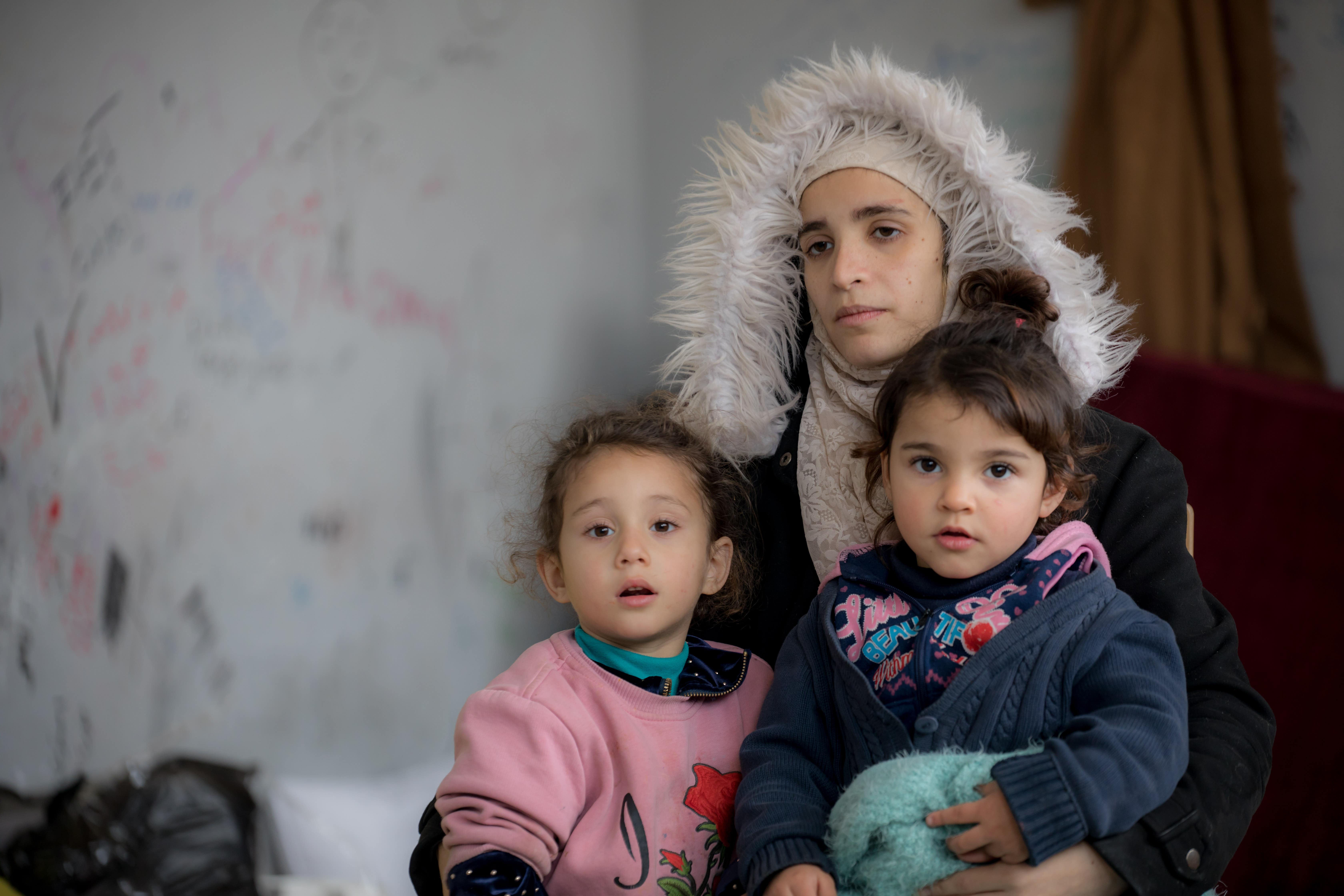 Aalaa, a pregnant mother, said she fainted as her daughters were pulled from her in the earthquake (Unicef/PA)