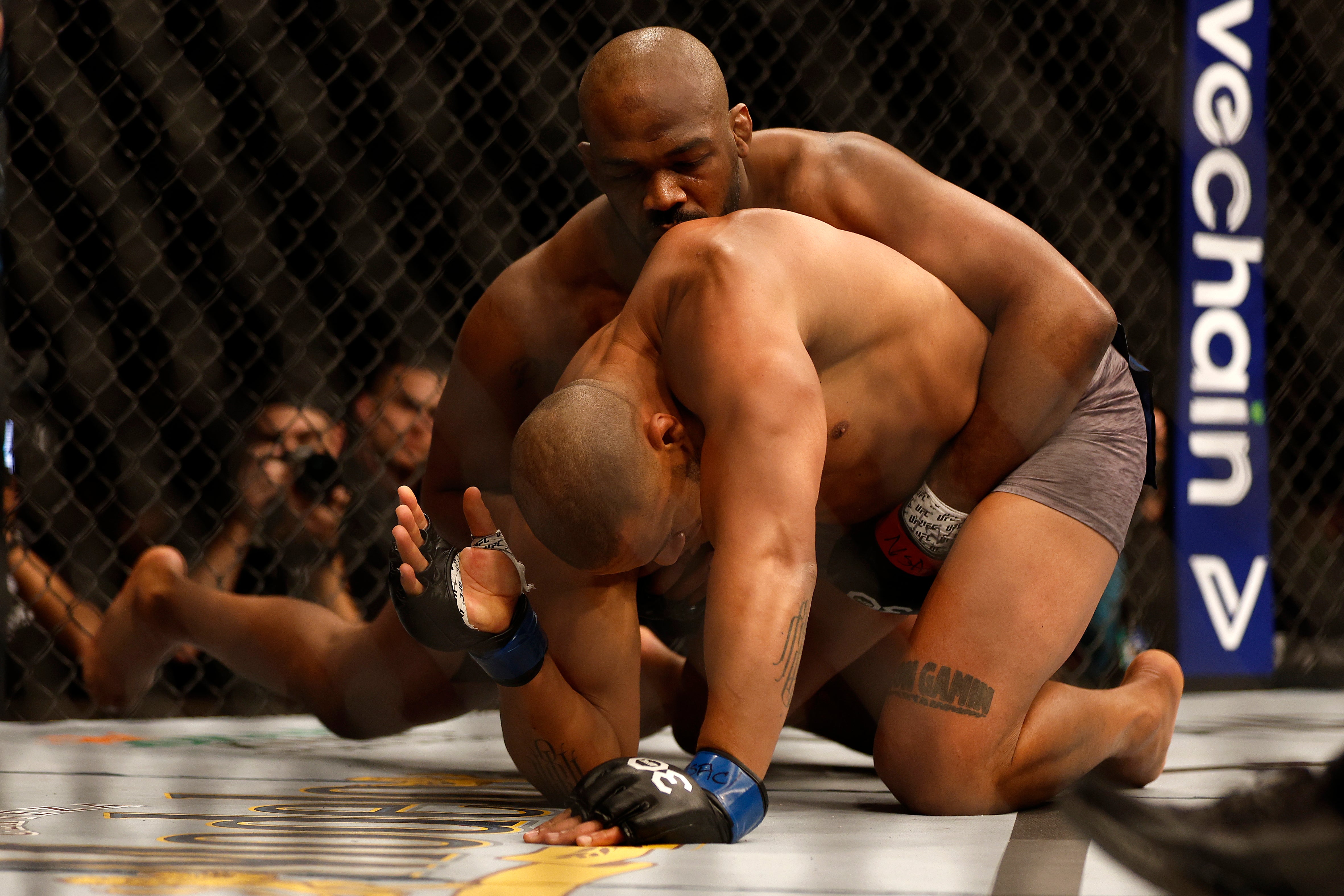 Jones took down Gane and submitted him with a rear naked choke in Round 1