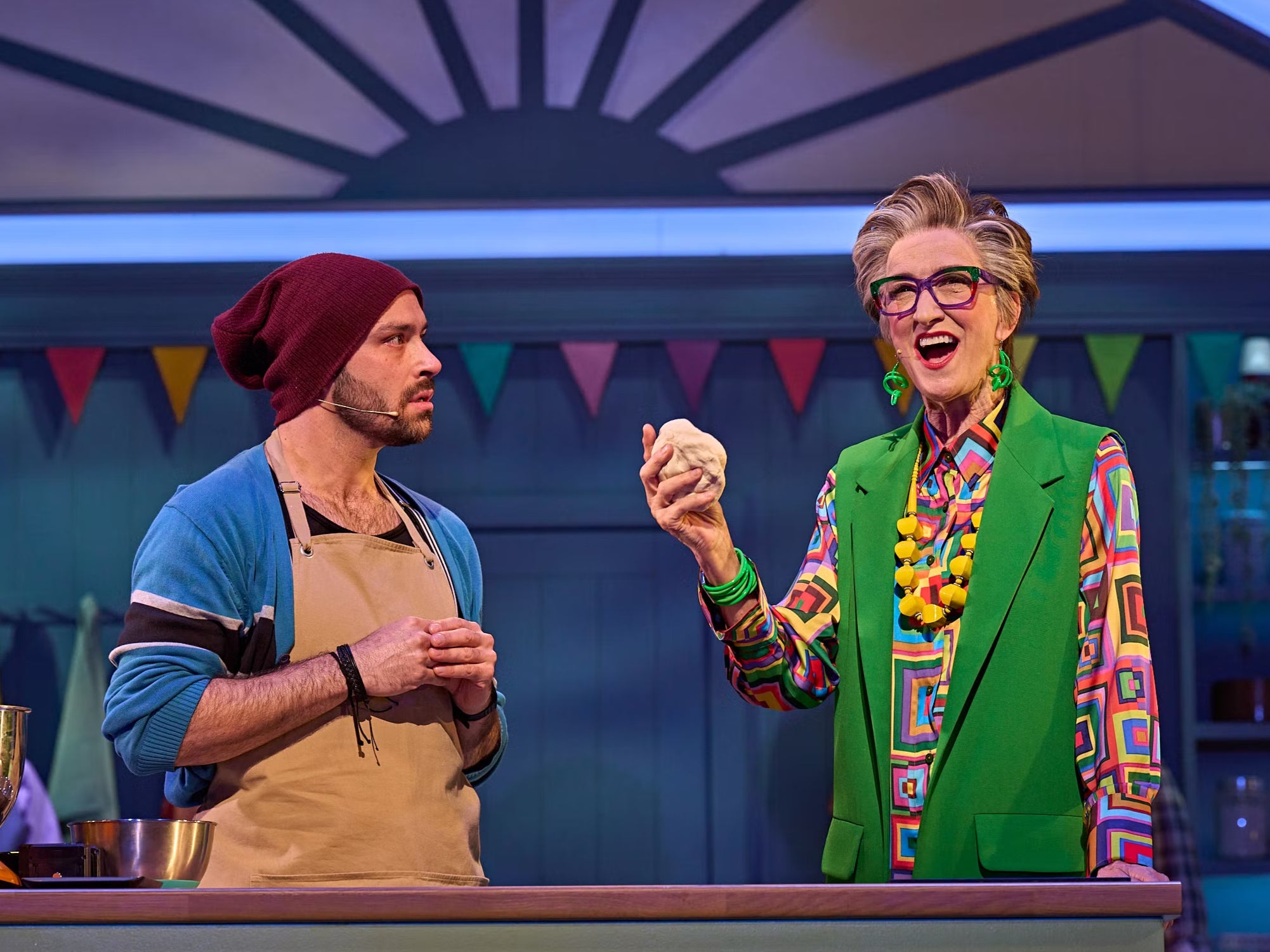 Jay Saighal (Dezza) and Haydn Gwynne (Pam Lee) in ‘The Great British Bake Off Musical’