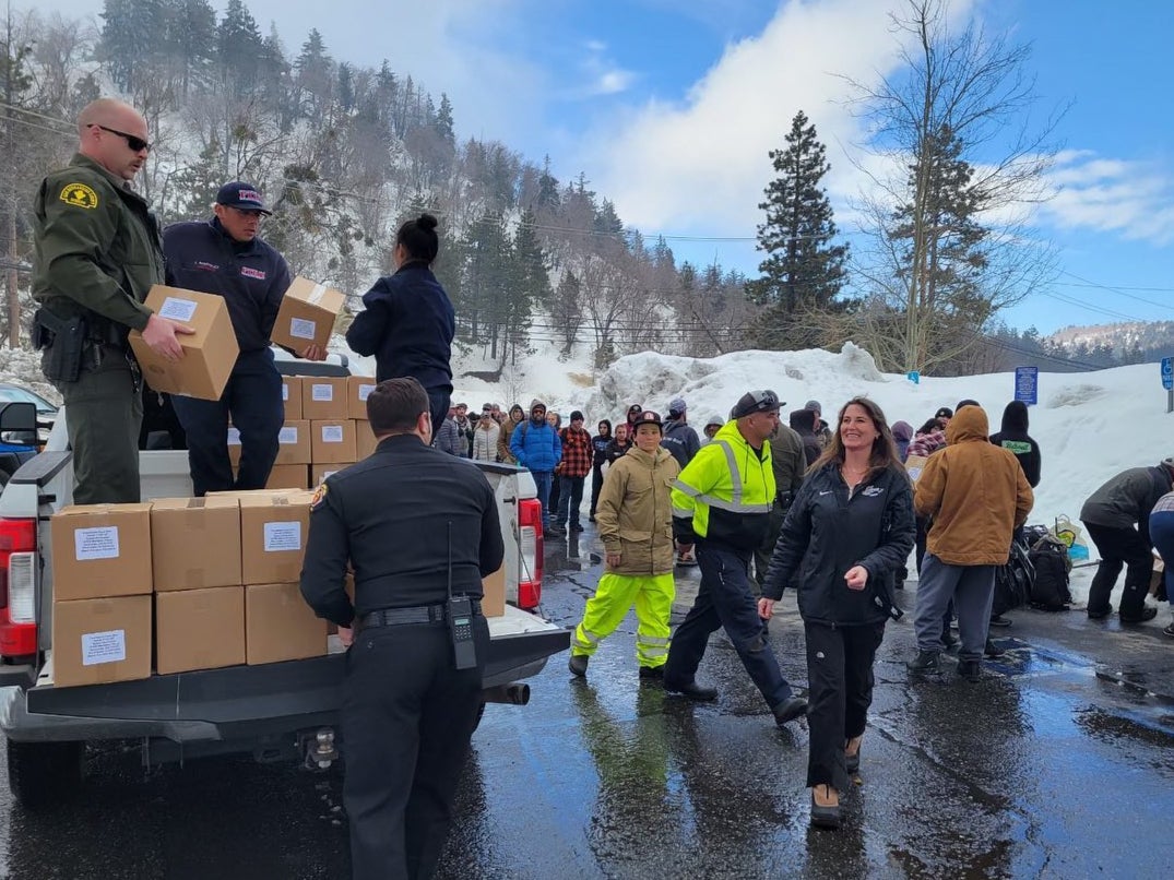 The San Bernadino County Sheriff’s Department distributes supplies