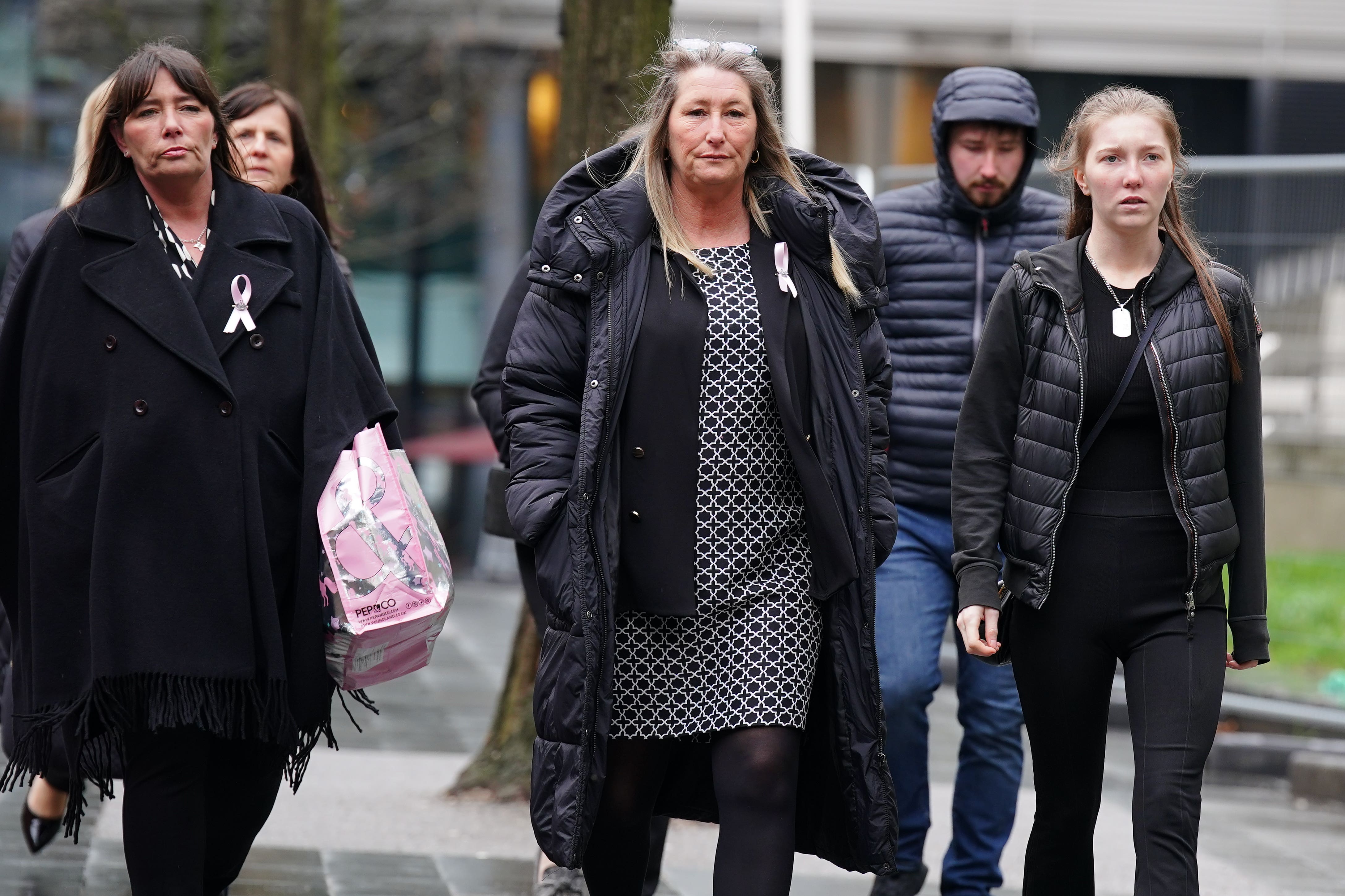 Cheryl Korbel (centre), mother of nine-year-old Olivia Pratt-Korbel, arrives with family members at Manchester Crown Court for the trial of Thomas Cashman, who is charged with murdering her daughter Olivia Pratt-Korbel, nine (Peter Byrne/PA)