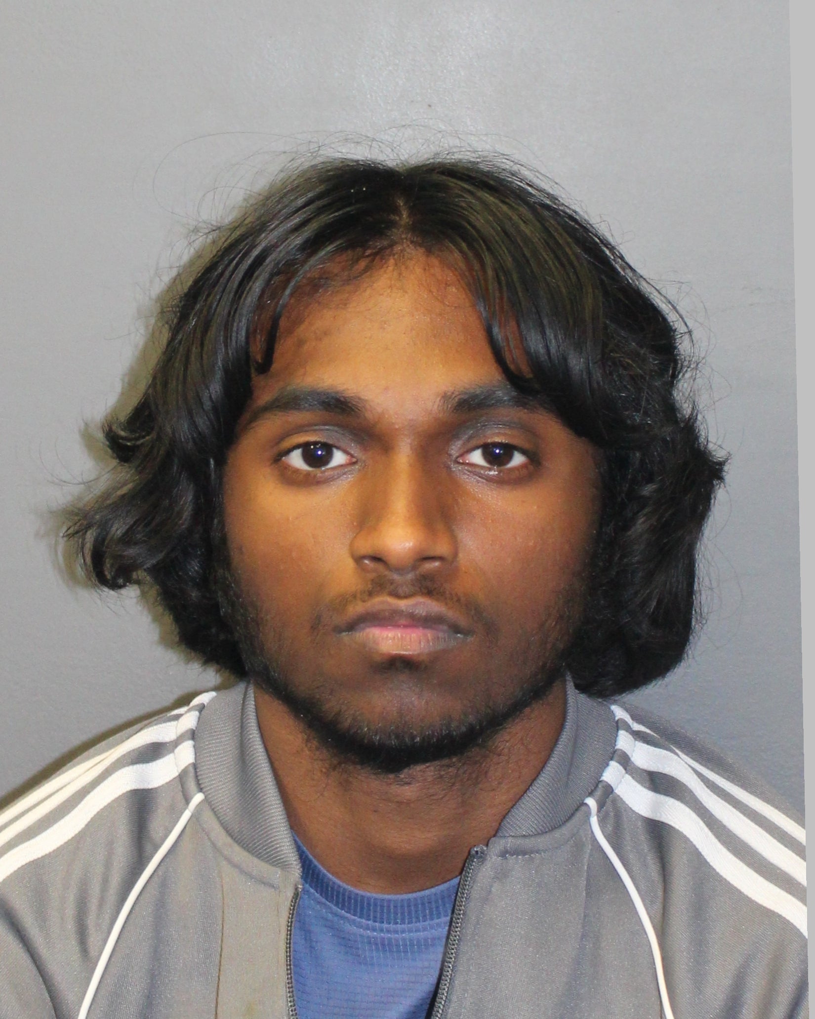 An image of a long knife appearing to have blood on it was found on Vanushan Balakrishnan’s phone, police said