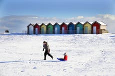 People wake up to snow as cold snap begins to sweep the UK