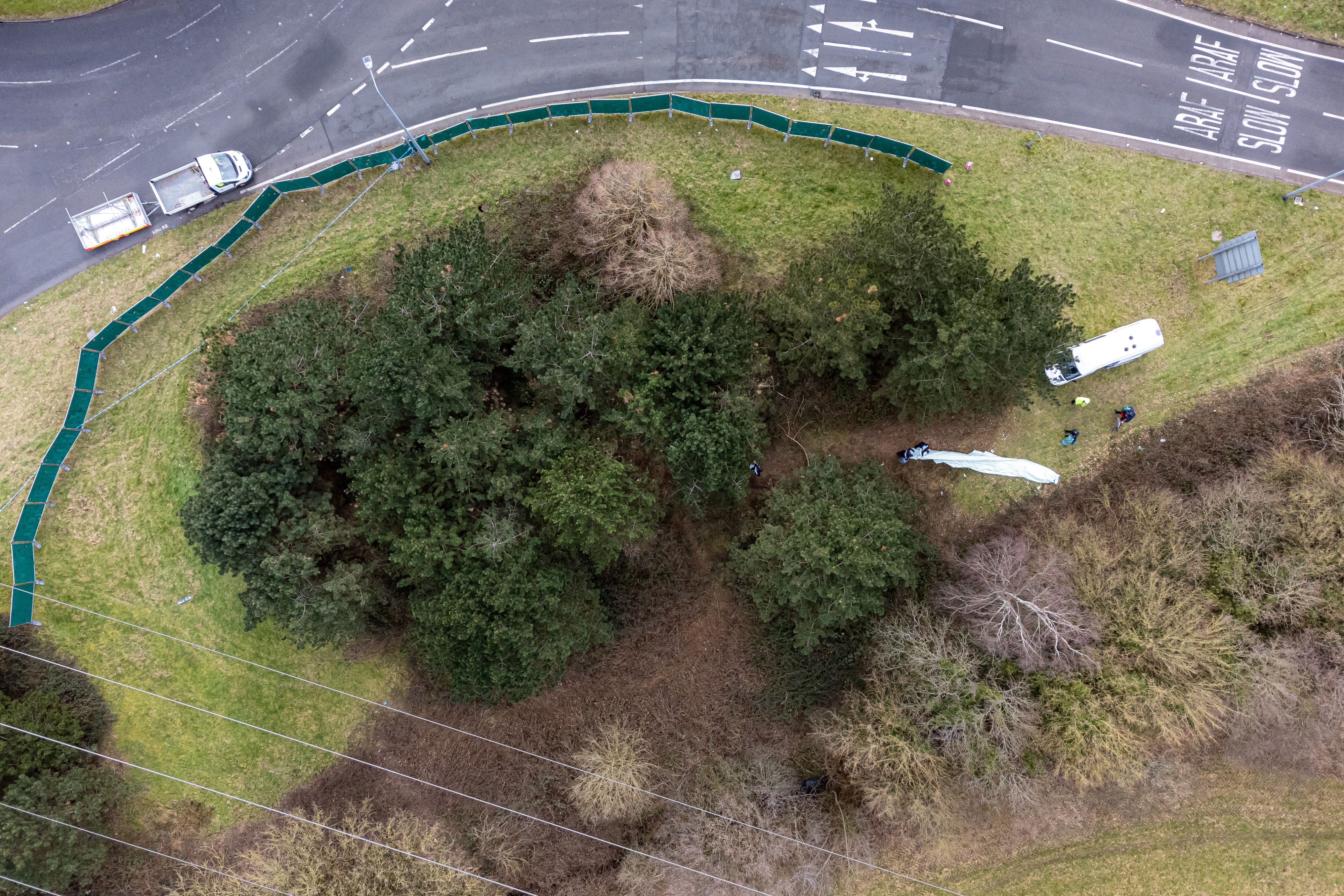 The scene in the St Mellons area of Cardiff where three people who disappeared on a night out died in a road traffic accident (Ben Birchall/PA)