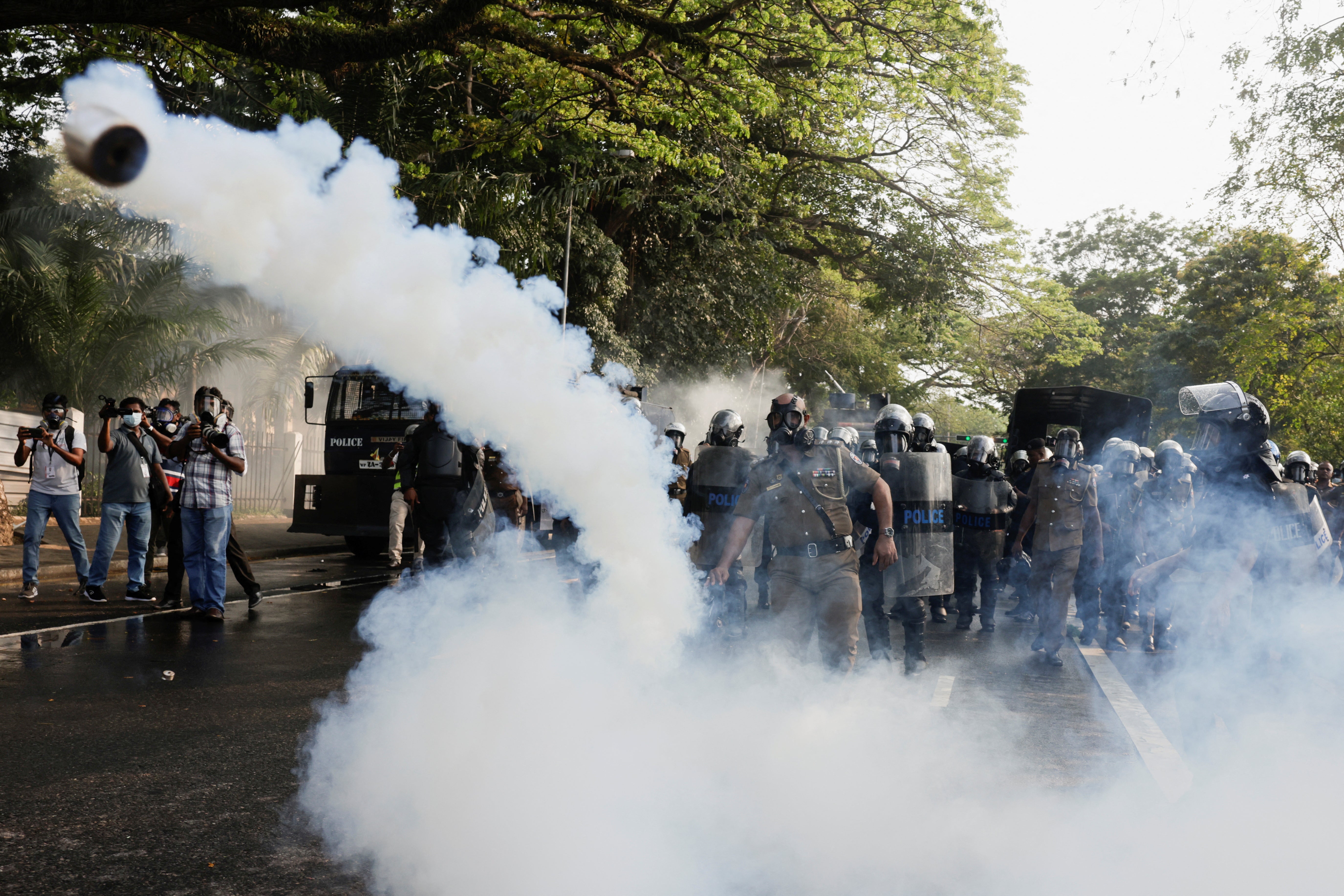 Police use tear gas to disperse Inter University students federation members during a protest demanding the implementation of the promised changes to the governing system