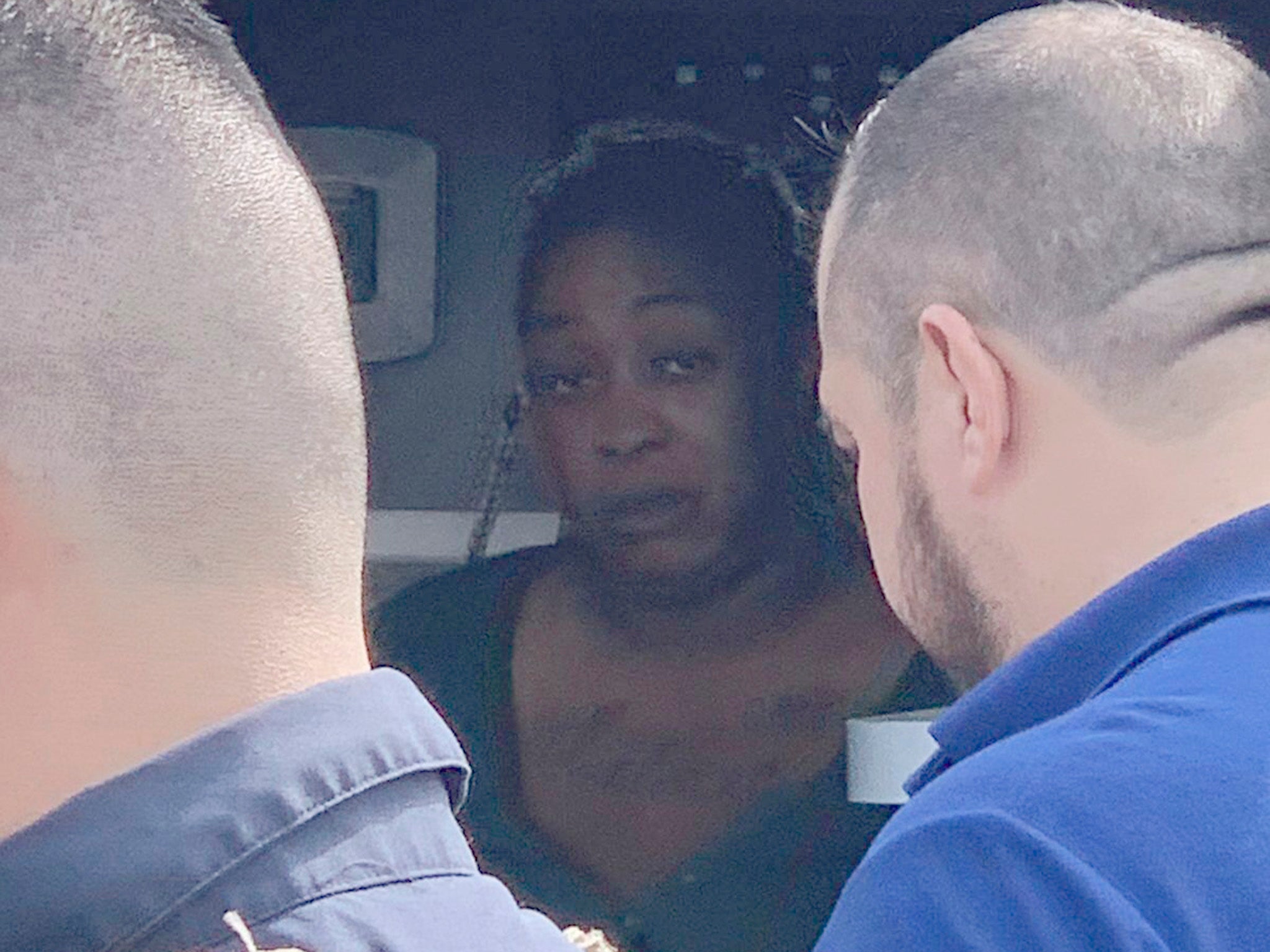 LaTavia McGee, abducted in Mexico last week, sits inside an ambulance after she was found alive in Ejido Longoreno