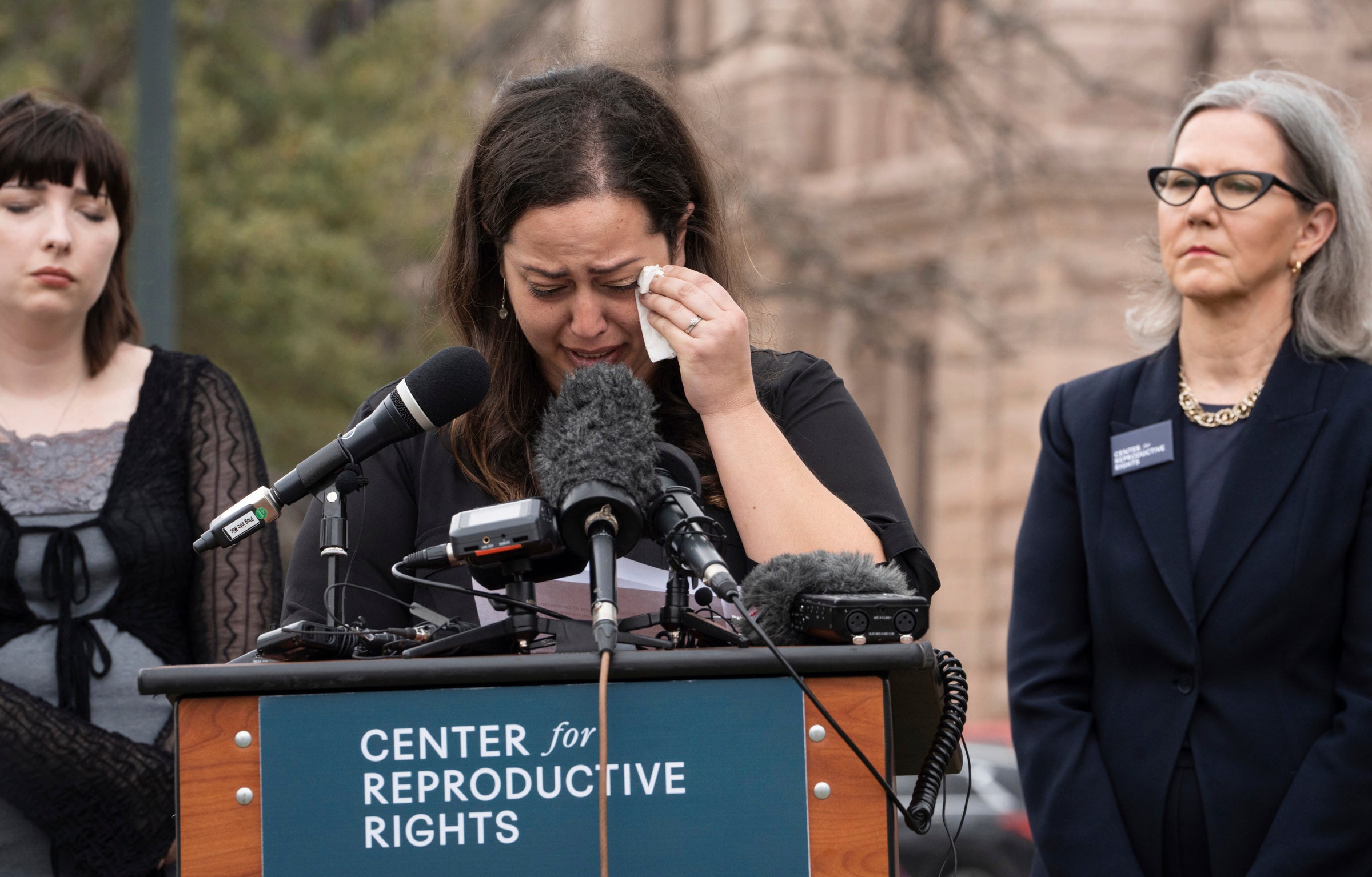 Anna Zargarian, one of five plaintiffs a lawsuit against Texas abortion laws, speaks in front of the state capitol in Austin, Texas on 7 March.