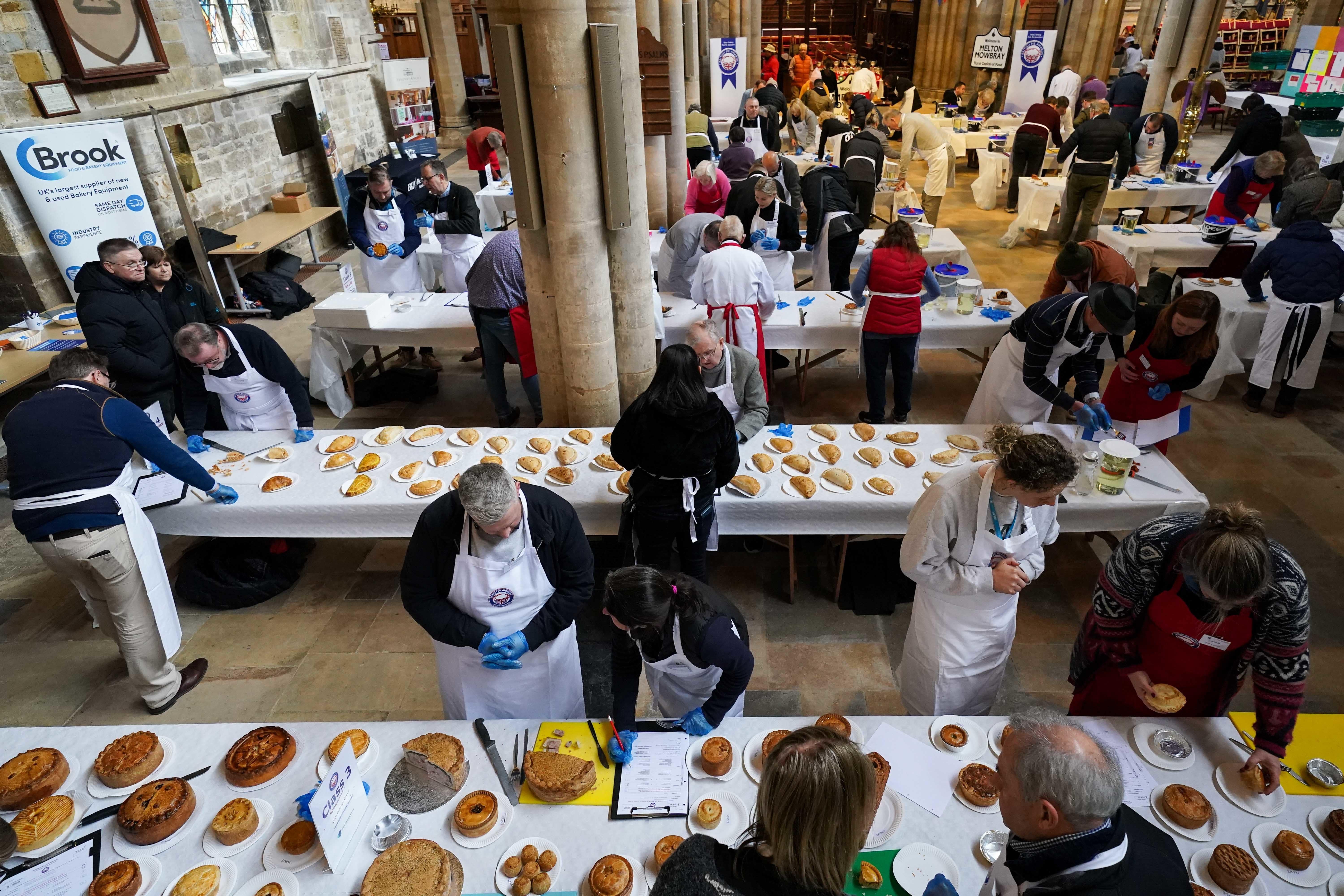 Pies being judged during the British Pie Awards (Jacob King/PA)