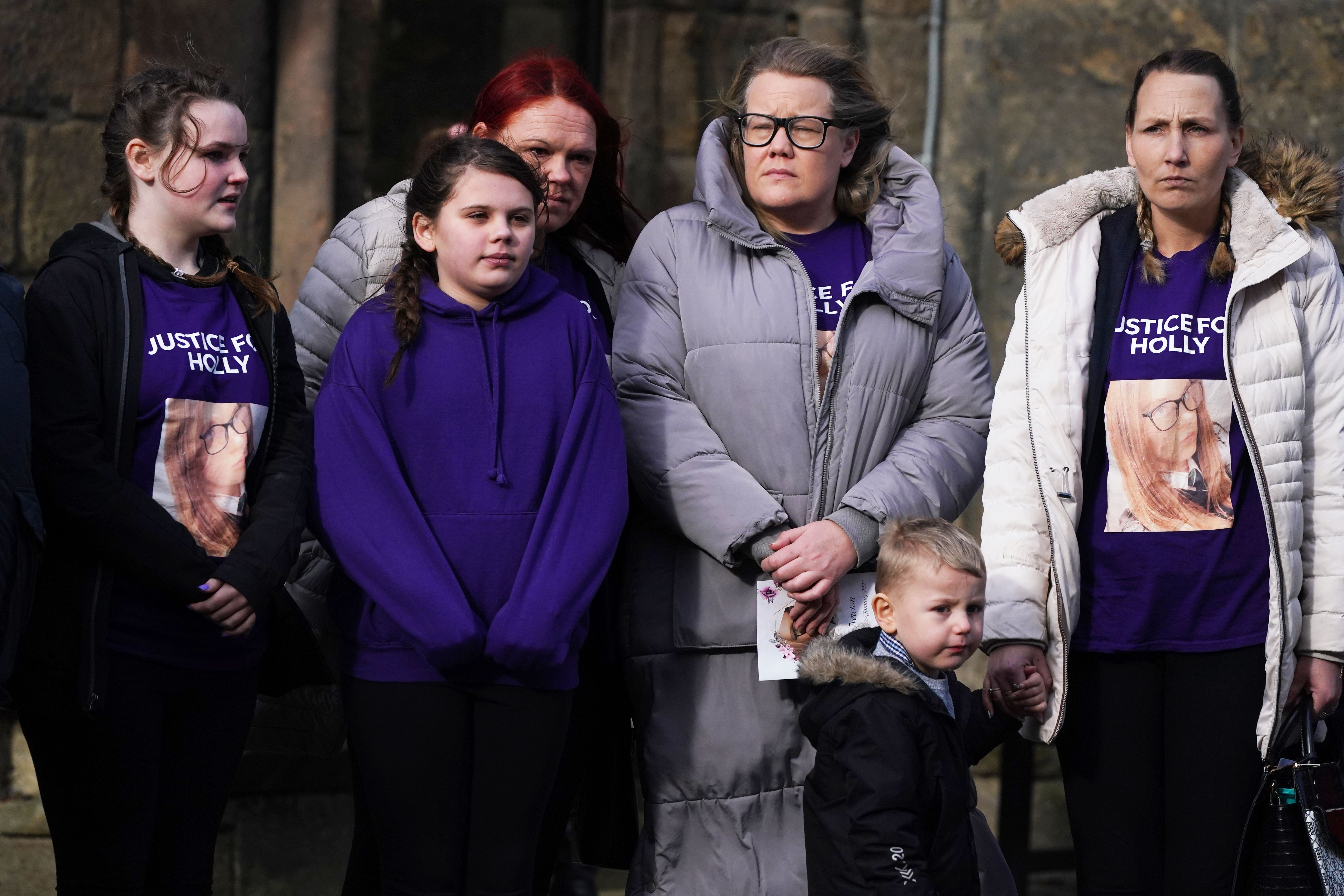 Holly Newton’s friends and family at her funeral (Owen Humphreys/PA)