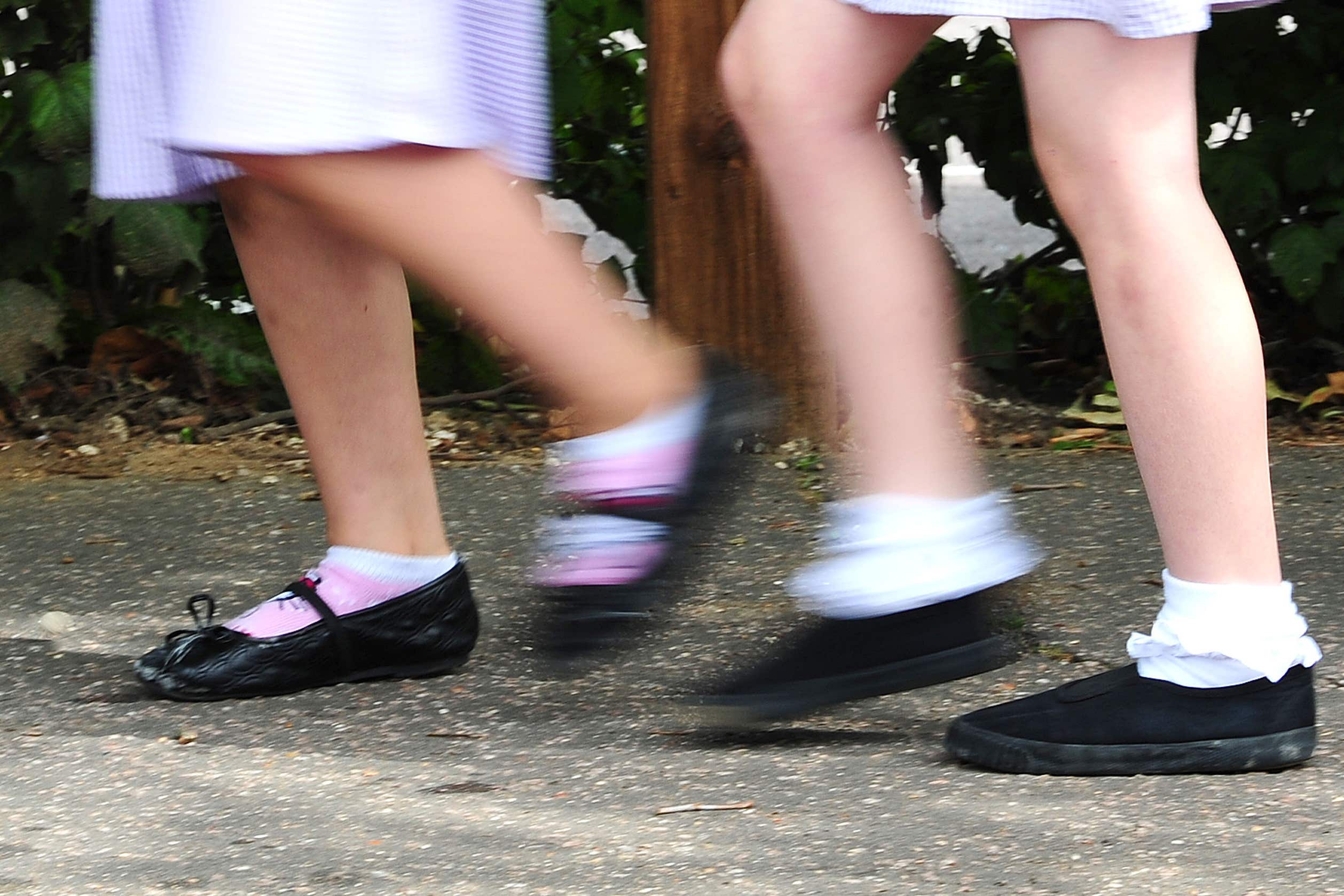 Parents have cut working hours due to high childcare costs, a Save The Children survey revealed (Ian West/PA)