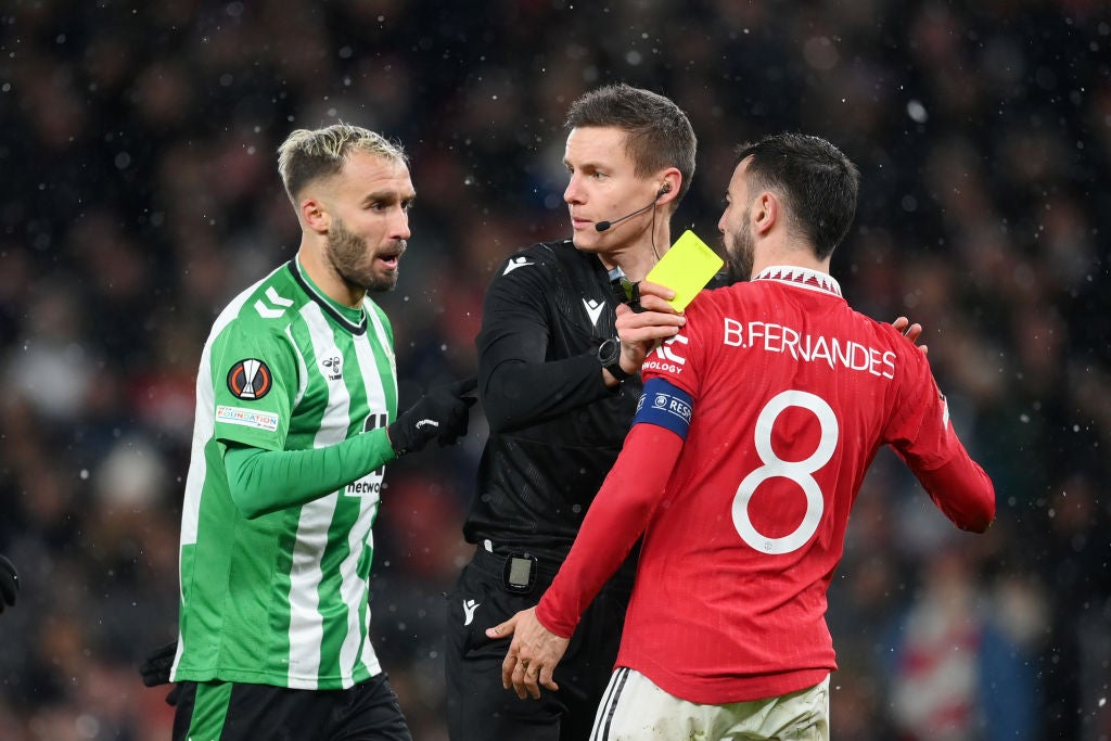 Fernandes was booked for challenge on Betis goalkeeper Claudio Bravo