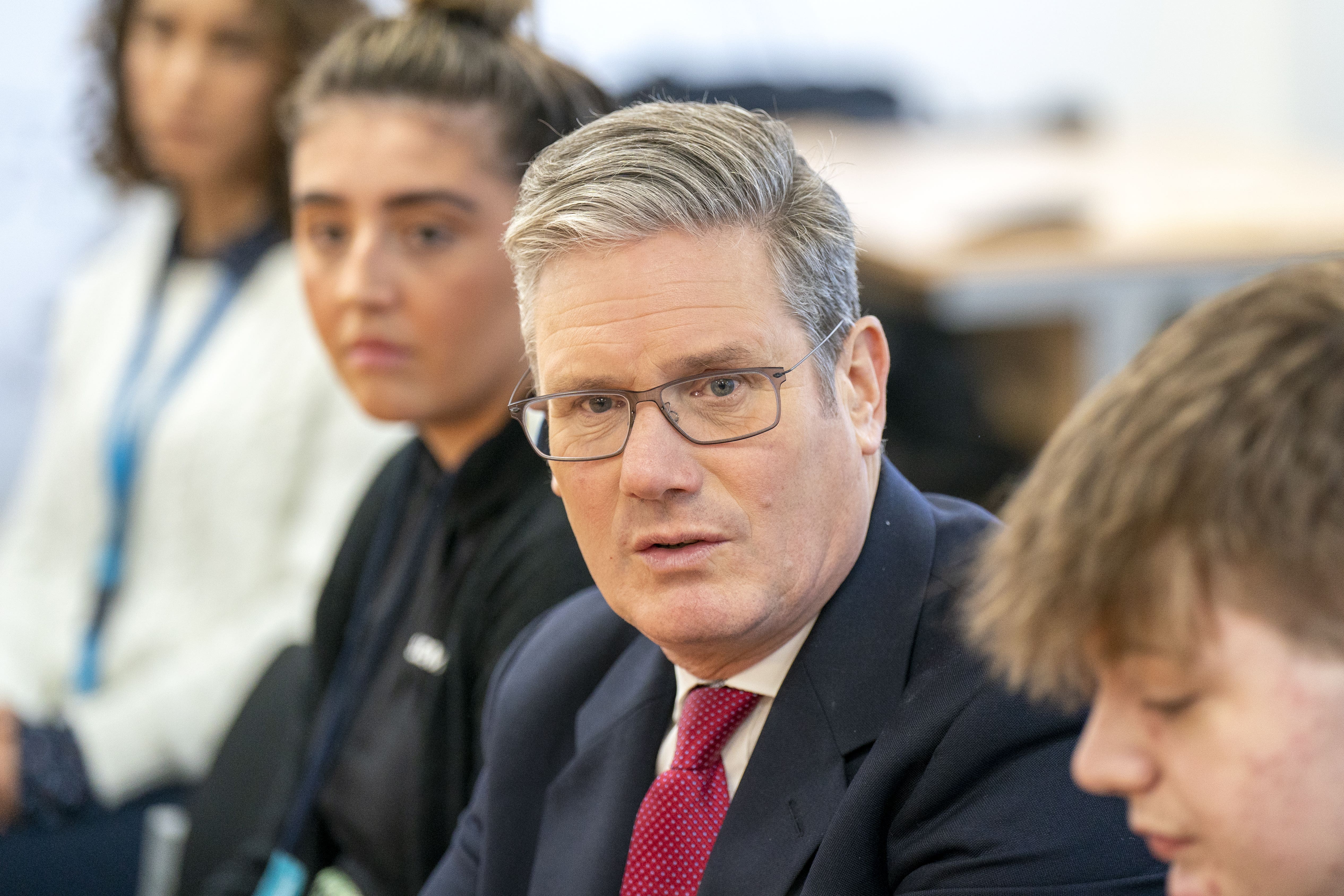 Labour leader Sir Keir Starmer meets apprentices during a visit to Siemens Rail Automation Cambuslang Depot in Glasgow (Jane Barlow/PA)