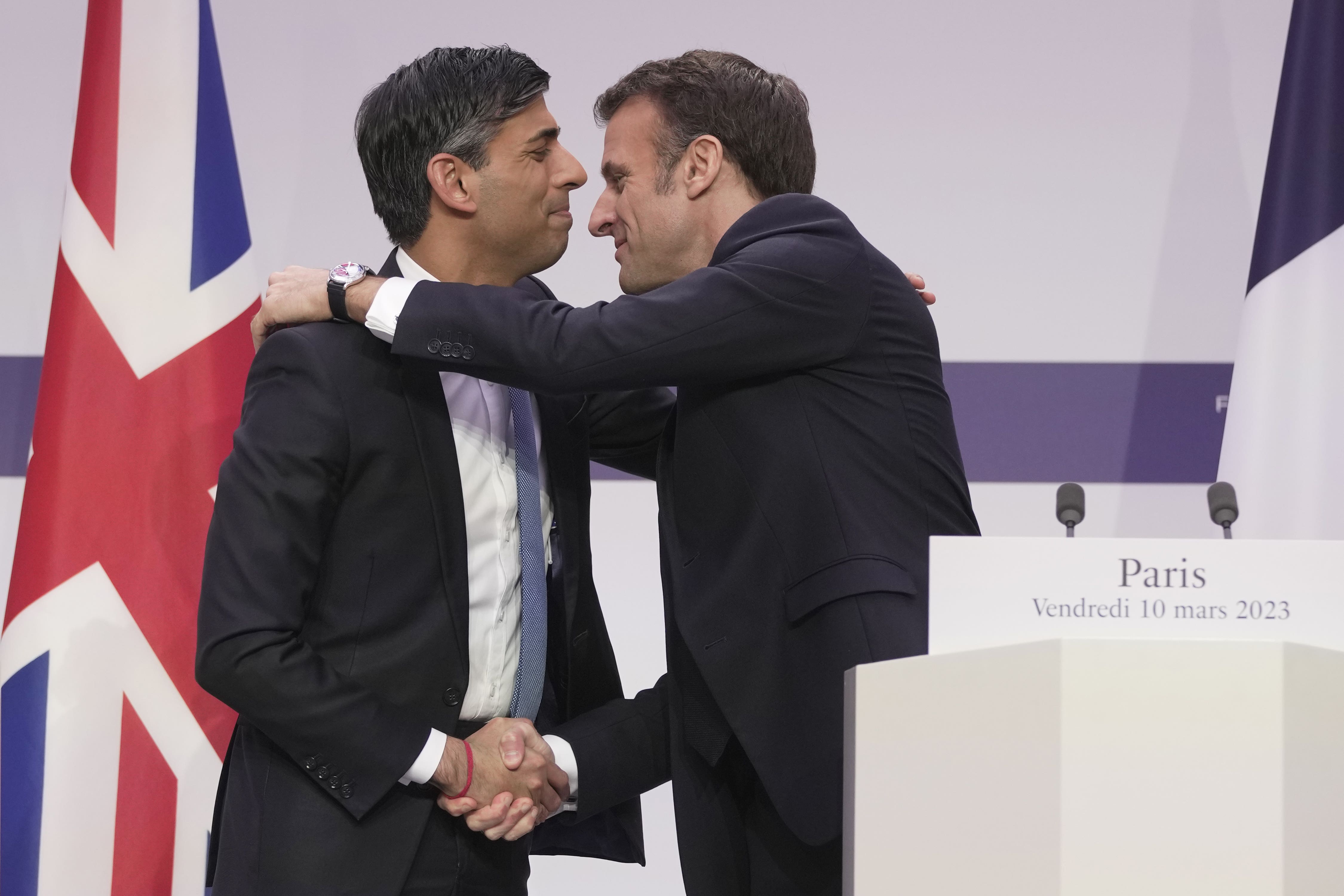 Le bromance: Sunak and Macron embrace