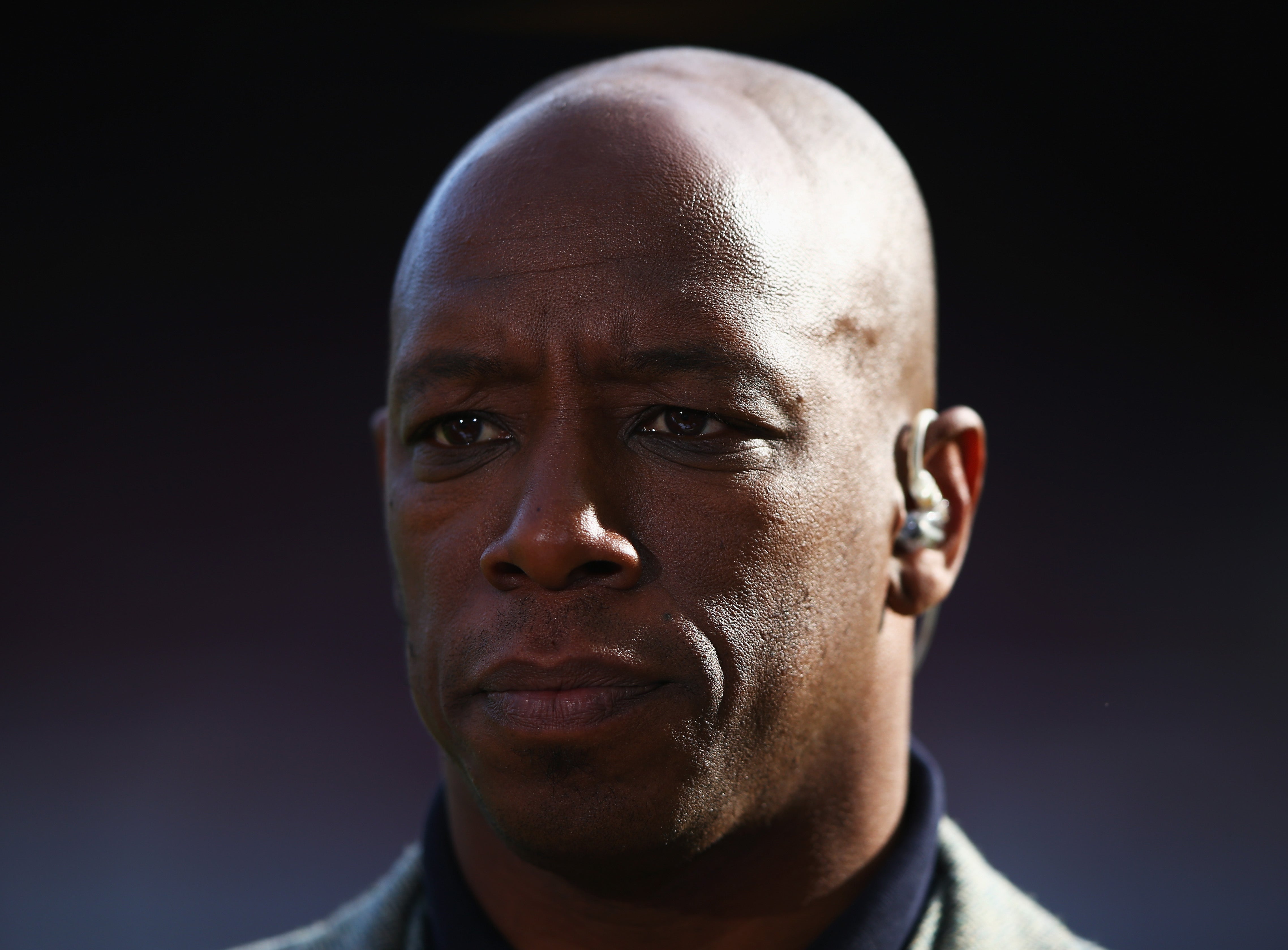 Ian Wright looks on prior to the Barclays Premier League match between West Ham United and Manchester City at Boleyn Ground