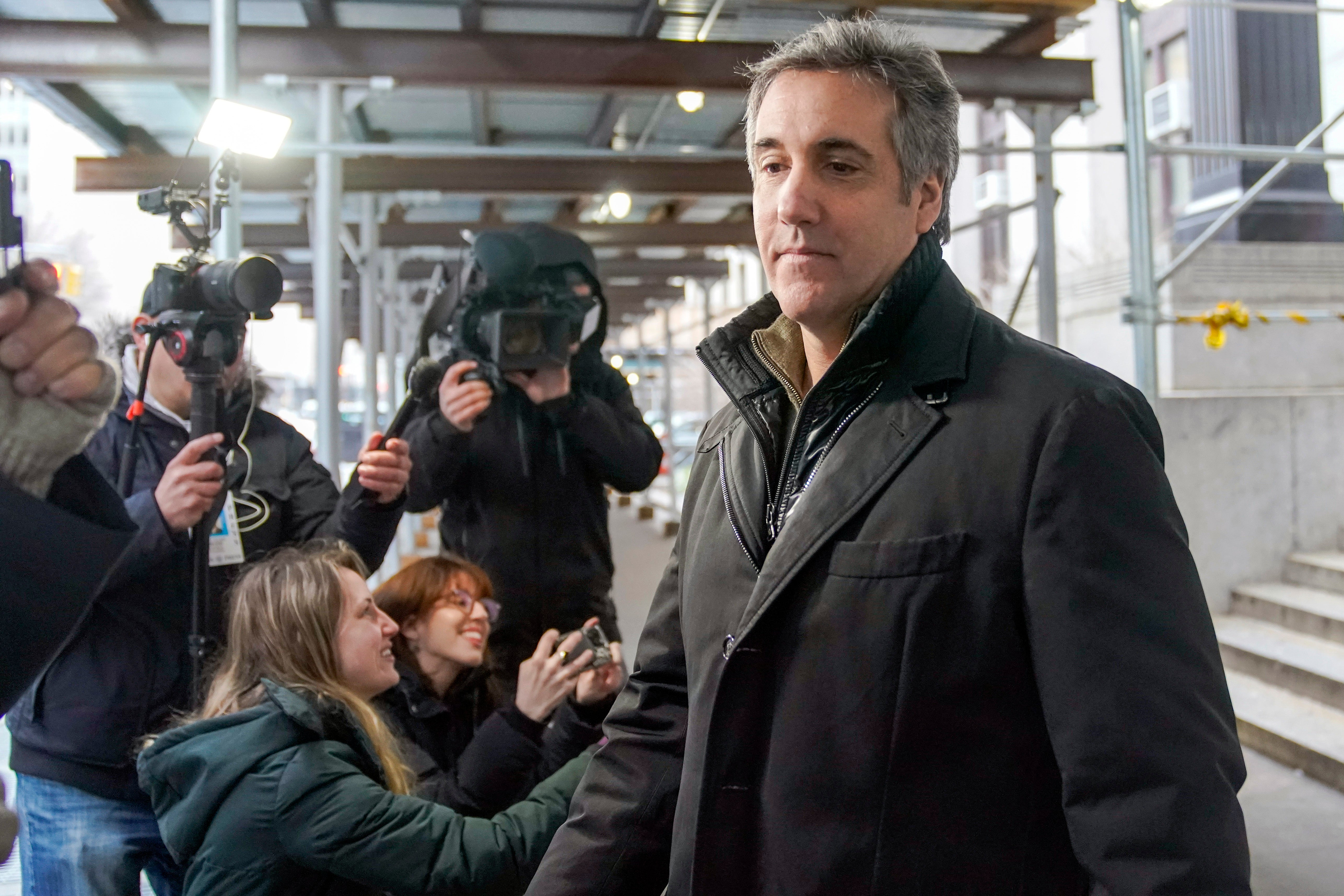 Michael Cohen leaves a lower Manhattan building after meeting with prosecutors on 10 March 2023, in New York (AP Photo/Mary Altaffer)