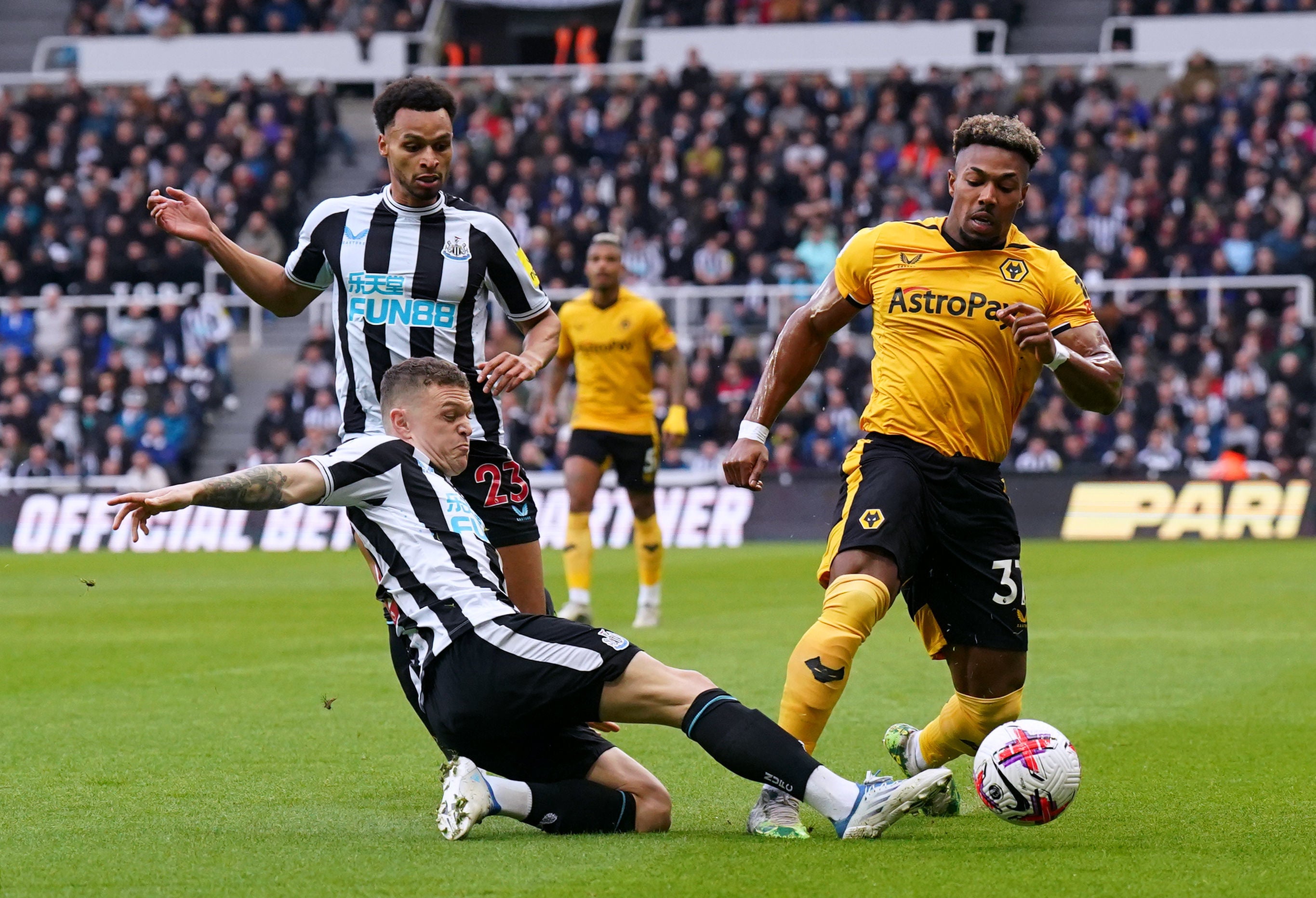 Kieran Trippier slides in on Adama Traore