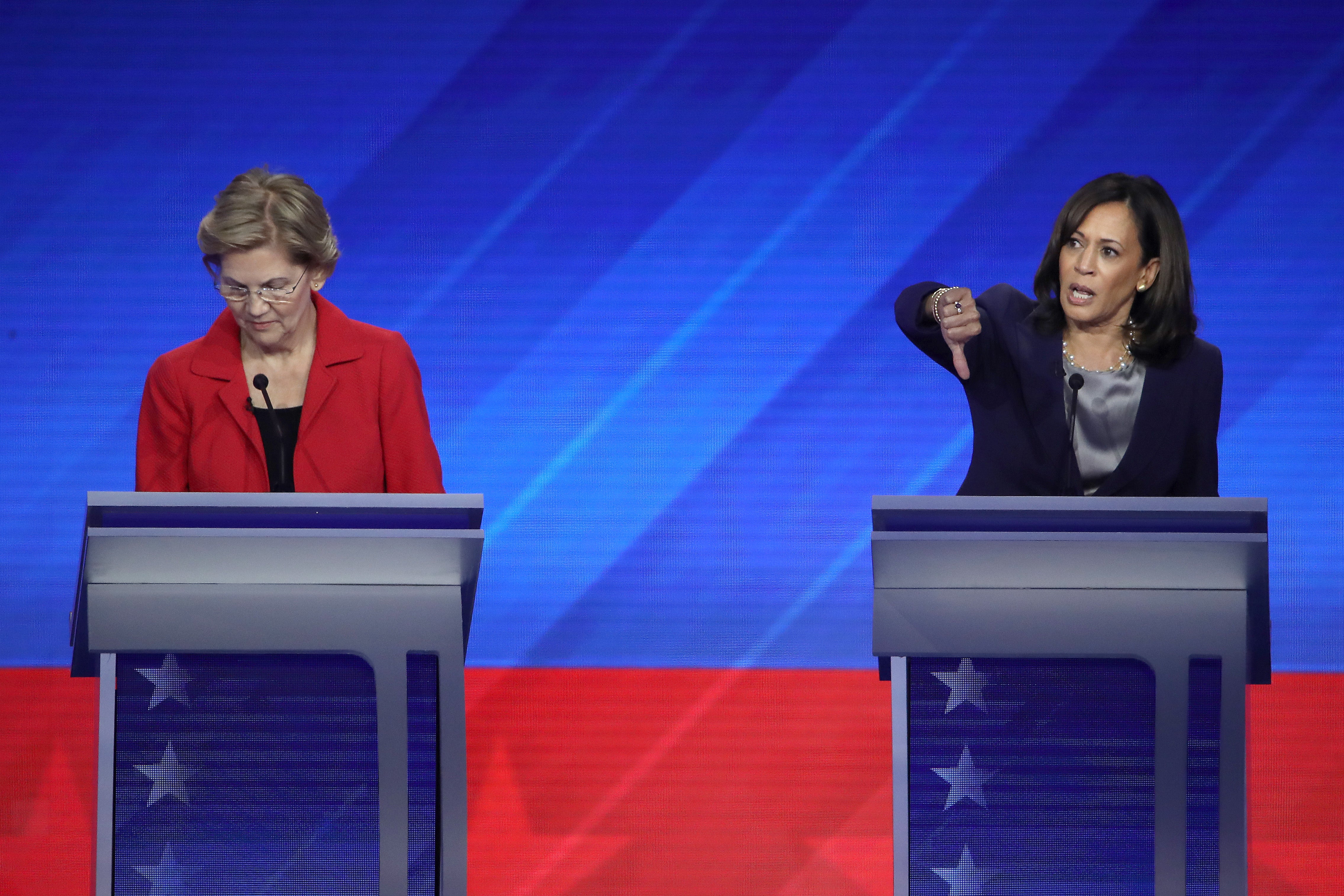 Thumbs down: Senator Elizabeth Warren, left, and Vice President Kamala Harris at a Democratic presidential debate at Texas Southern University in September 2019