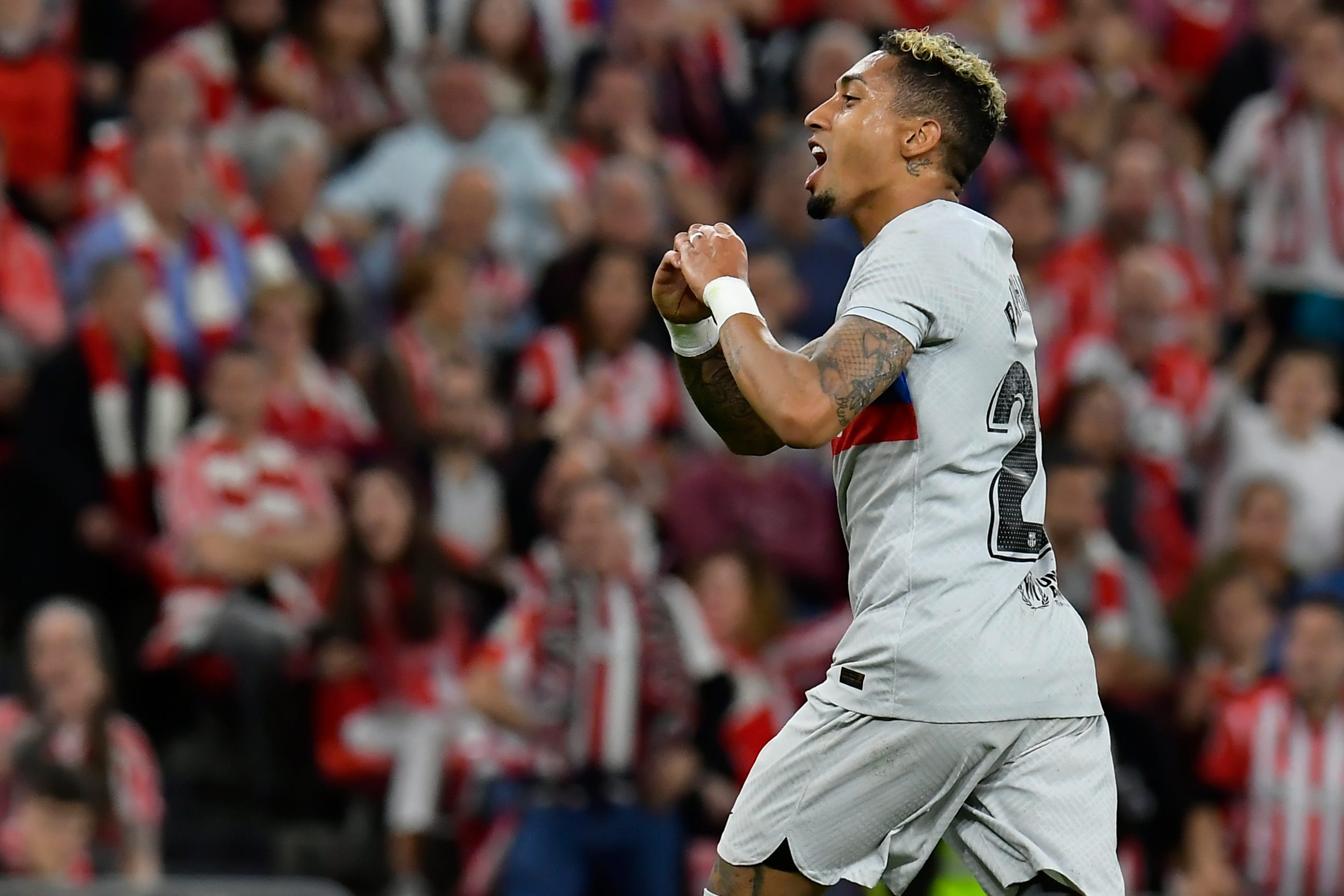 Raphinha celebrates after scoring against Athletic Bilbao (Alvaro Barrientos/AP)