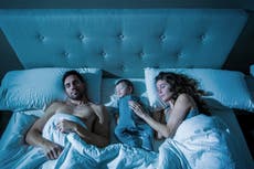 Parents who co-sleep with babies must be advised on sudden infant death syndrome, experts say