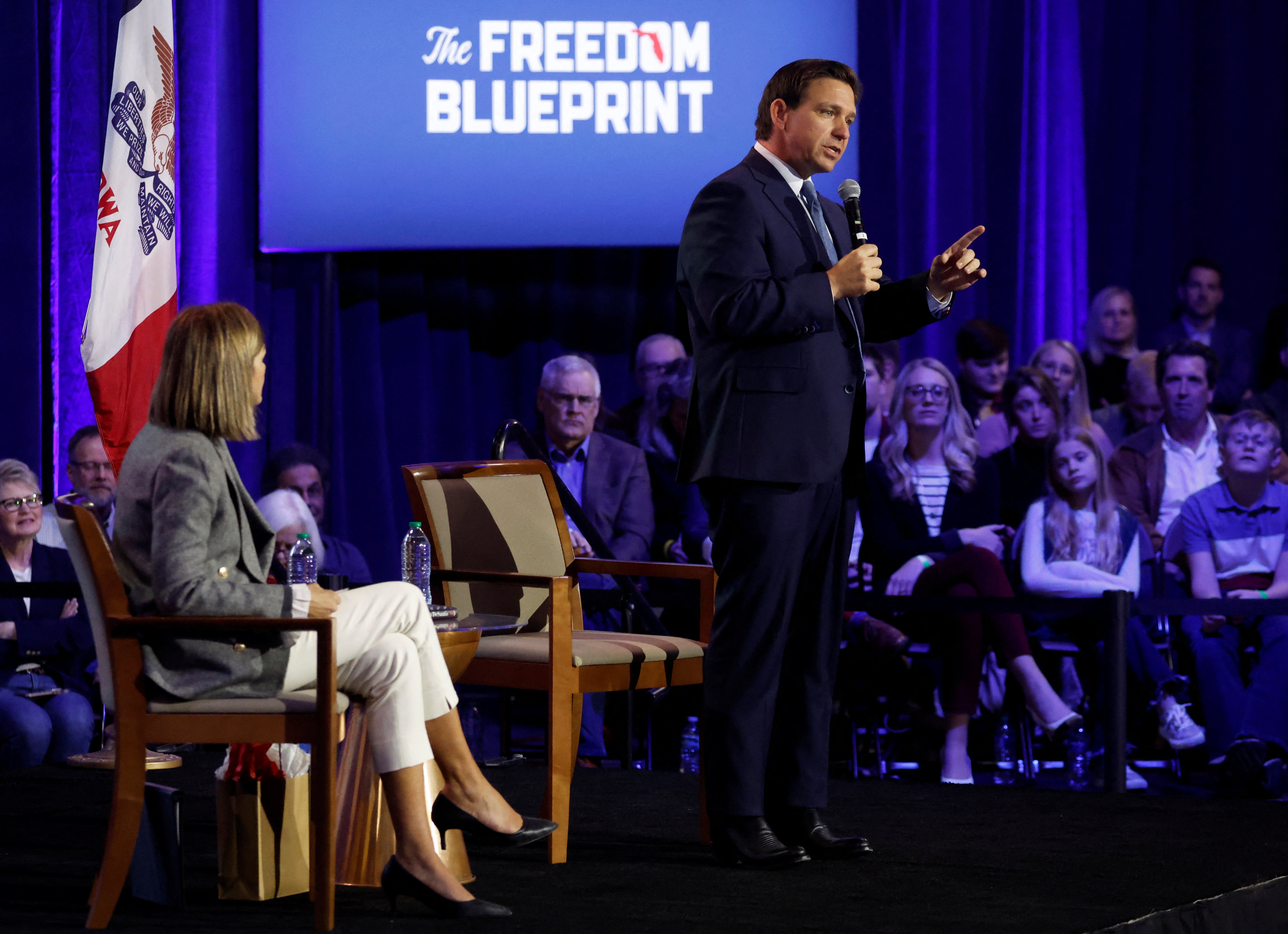 Florida Governor Ron DeSantis, with Iowa Governor Kim Reynolds, makes his first trip to the early voting state of Iowa for a book tour stop at the Iowa State Fairgrounds in Des Moines, Iowa, U.S. March 10, 2023