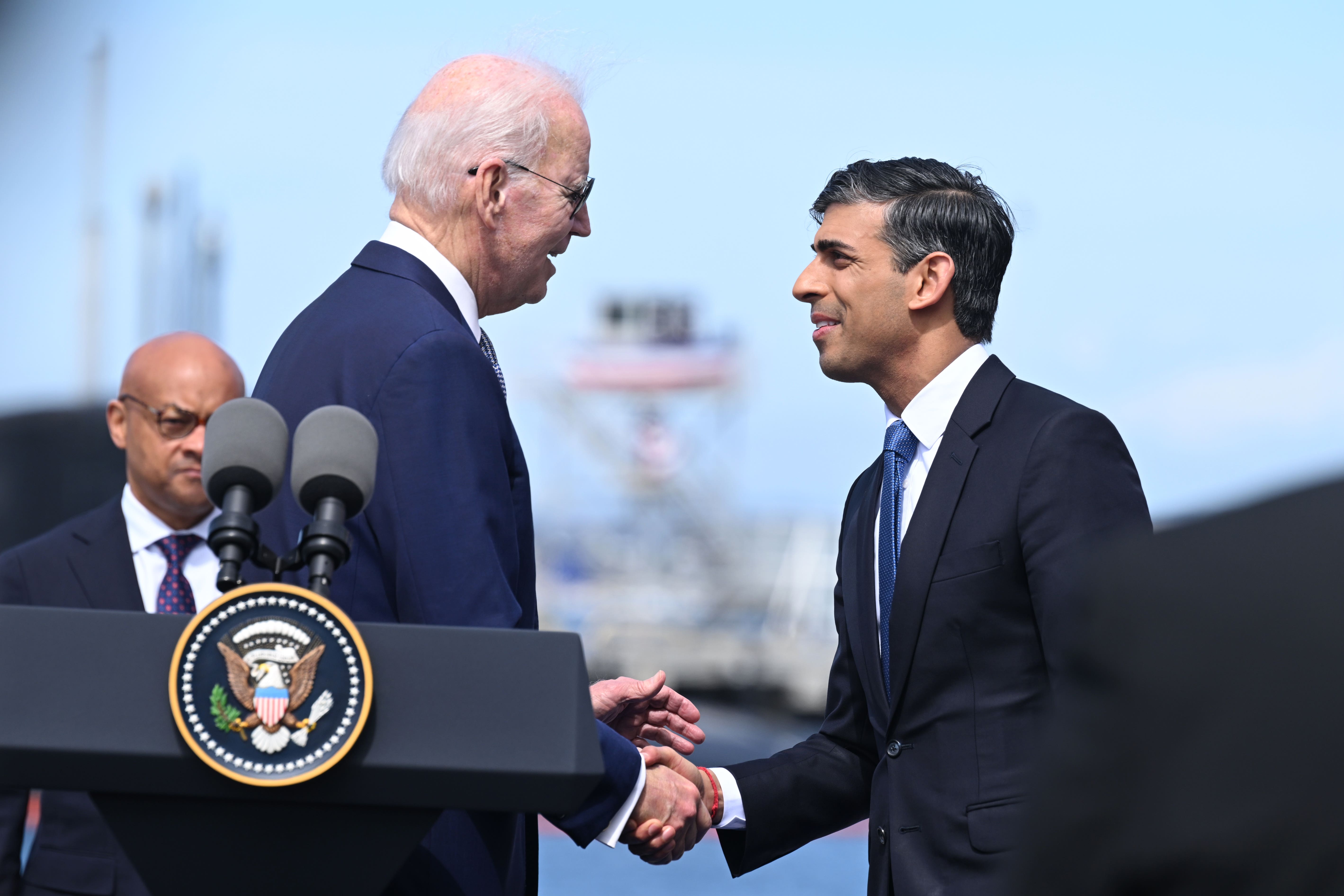 Prime Minister Rishi Sunak shakes hands with US president Joe Biden (Leon Neal/PA)