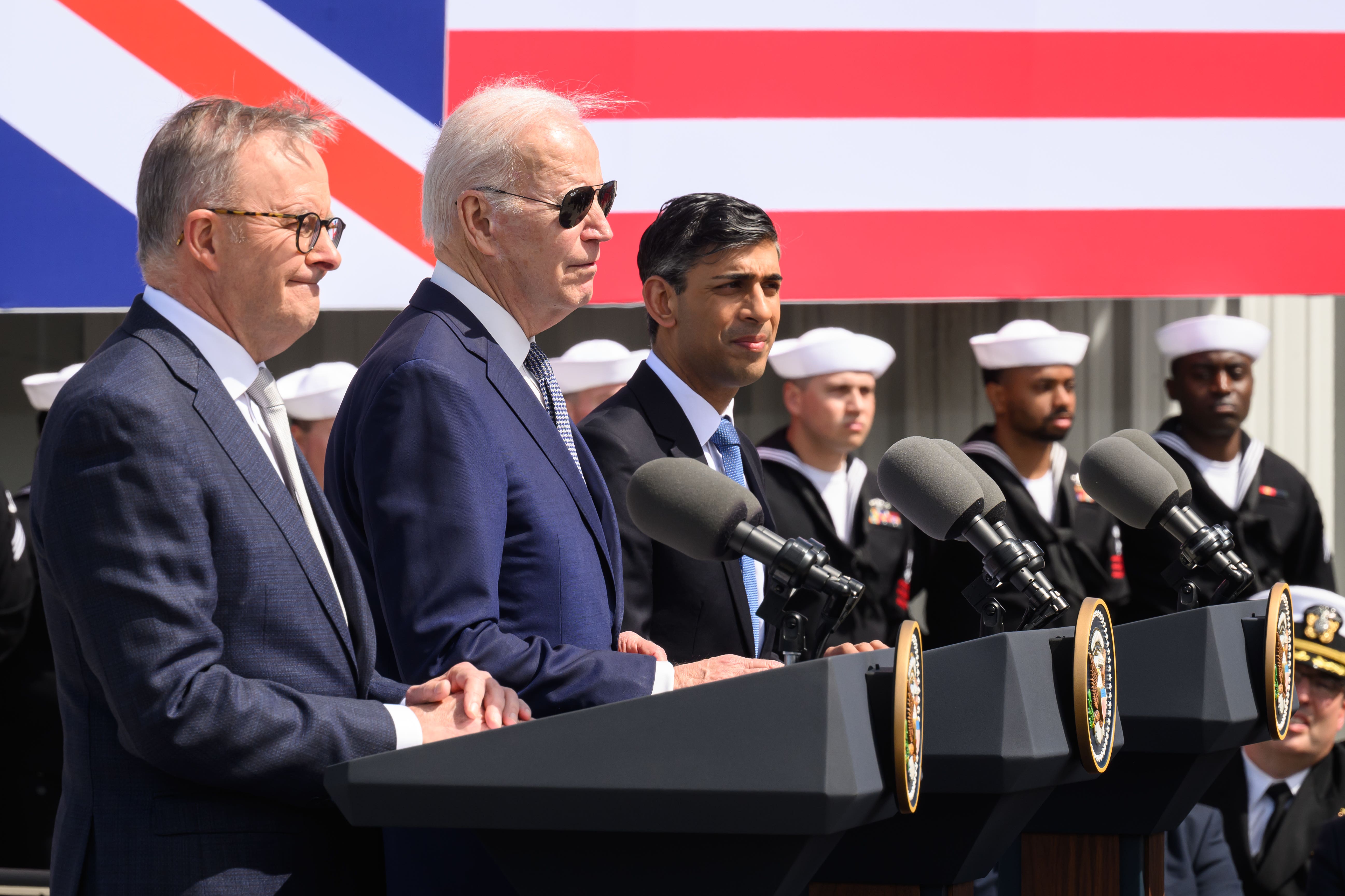 (left to right) Australian prime minister Anthony Albanese, US President Joe Biden and Prime Minister Rishi Sunak announce the latest stage of the Aukus agreement (Leon Neal/PA)