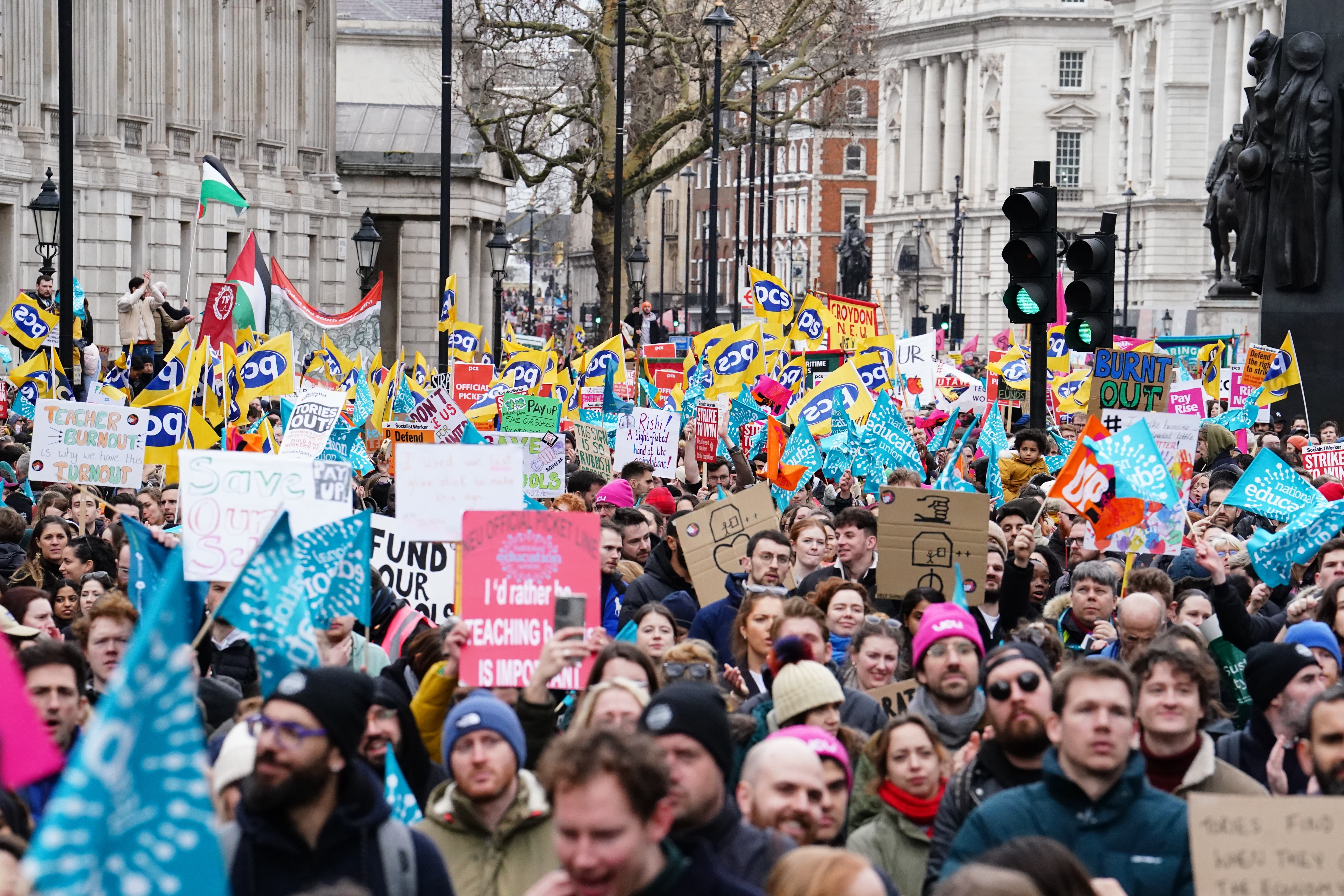 Striking members and supporters of the National Education Union (NEU) on Whitehall, on a march from Portland Place to Westminster where they will hold a rally against the Government’s controversial plans for a new law on minimum service levels during strikes. Picture date: Wednesday February 1, 2023.