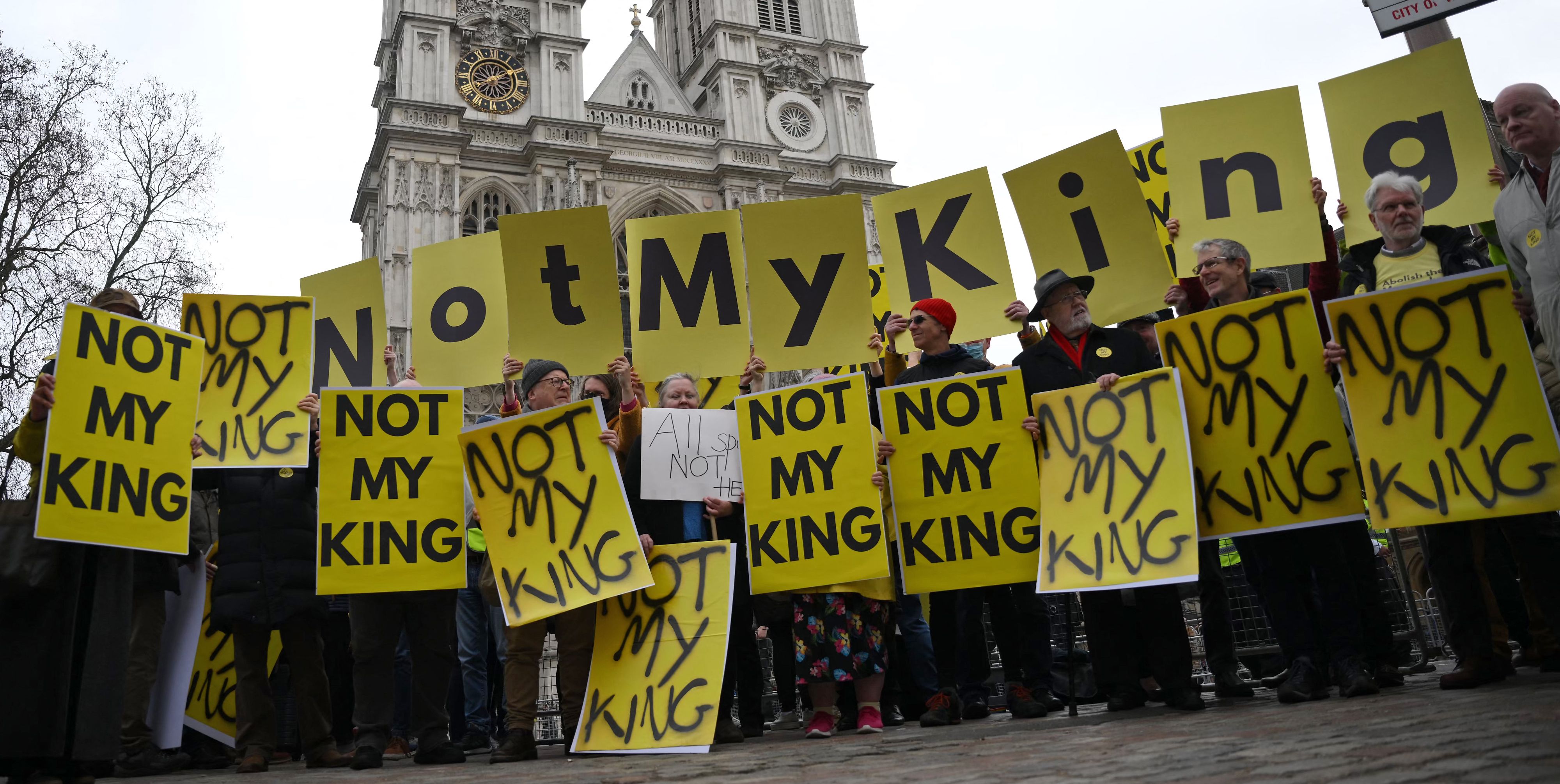 Anti-monarchy demonstrators protest against the royal family outside Westminster Abbey on 13 March 2023