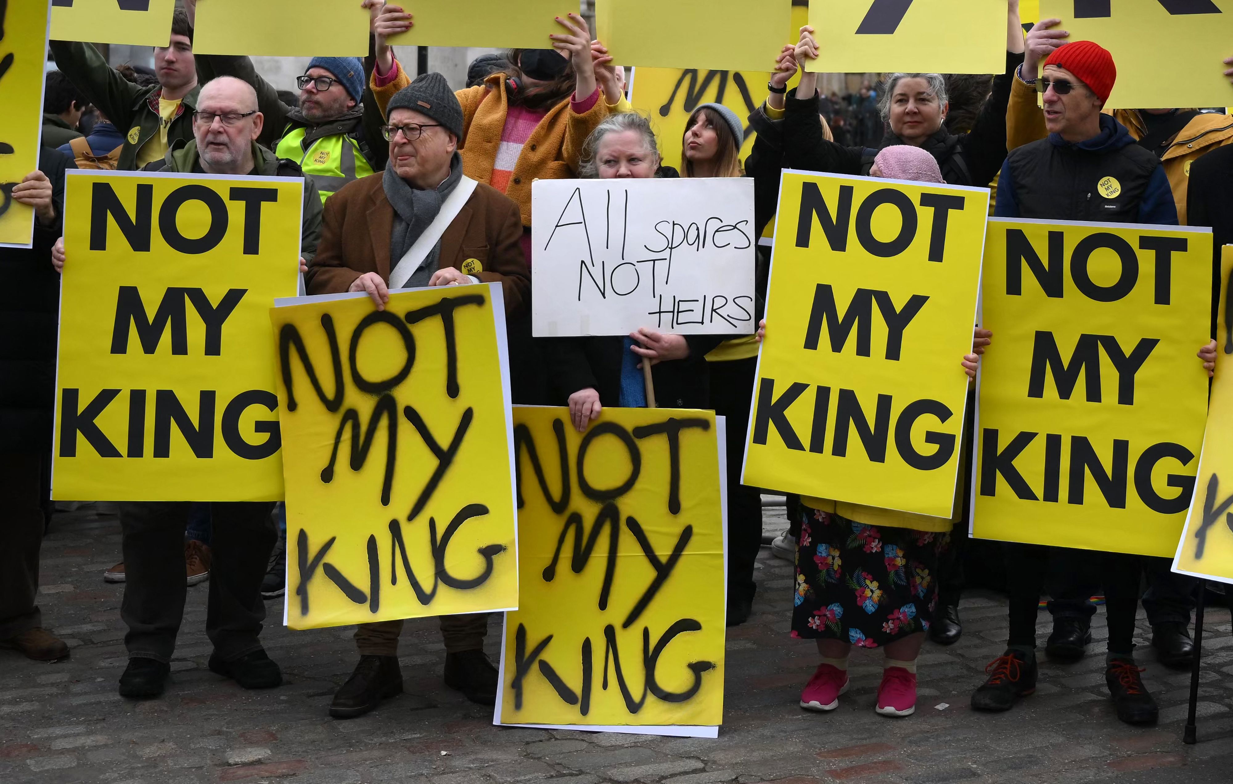 Anti-monarchy demonstrators protest against the royal family outside Westminster Abbey on 13 March 2023