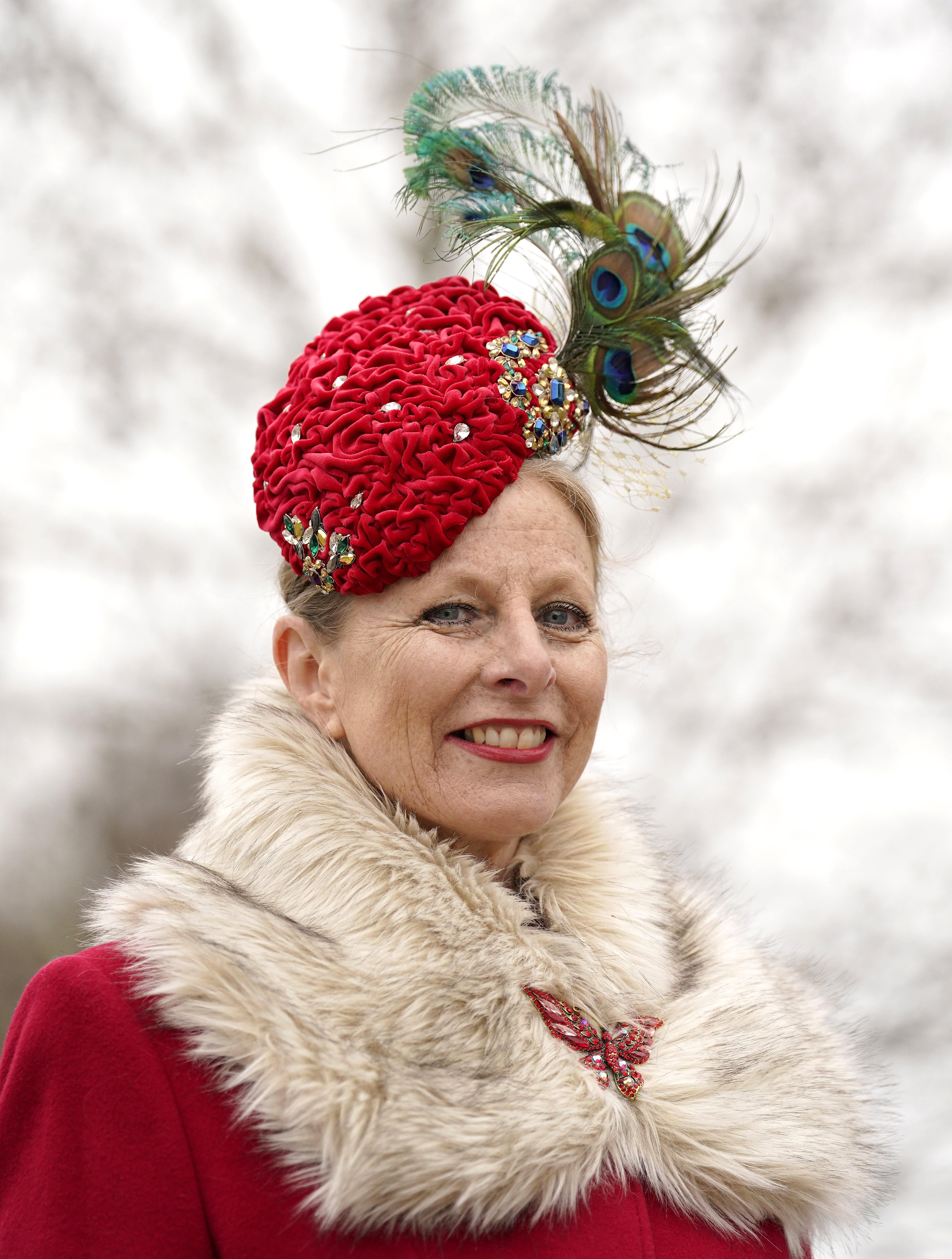 Many attendees wear elaborate hats and fascinators to Cheltenham