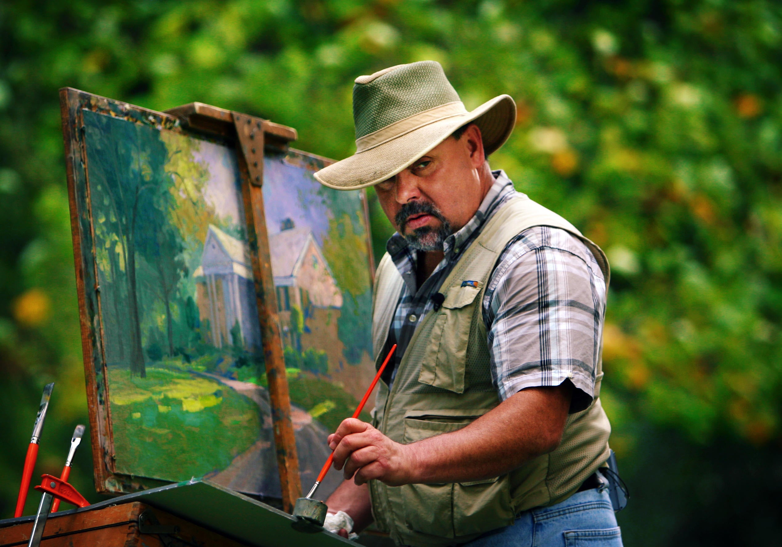 California painter Thomas Kinkade built an art empire known for serene scenes featuring a characteristic glow; he was nicknamed the ‘Painter of Light’