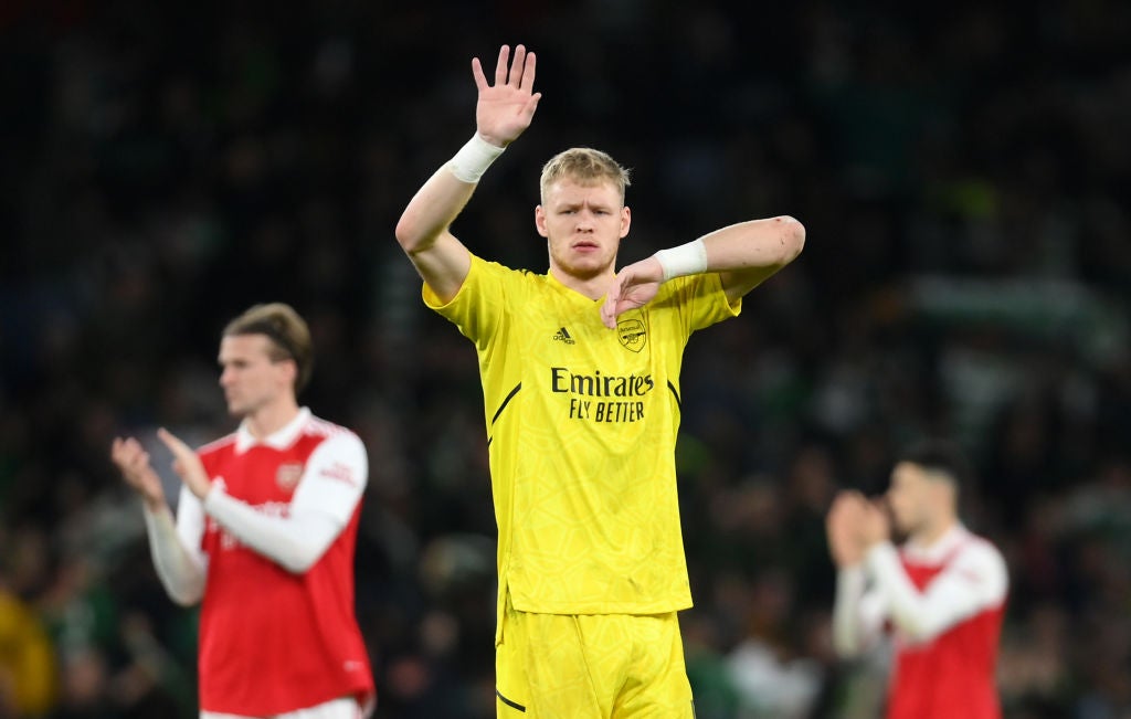 A dejected Aaron Ramsdale acknowledges the fans after Arsenal were knocked out of the Europa League