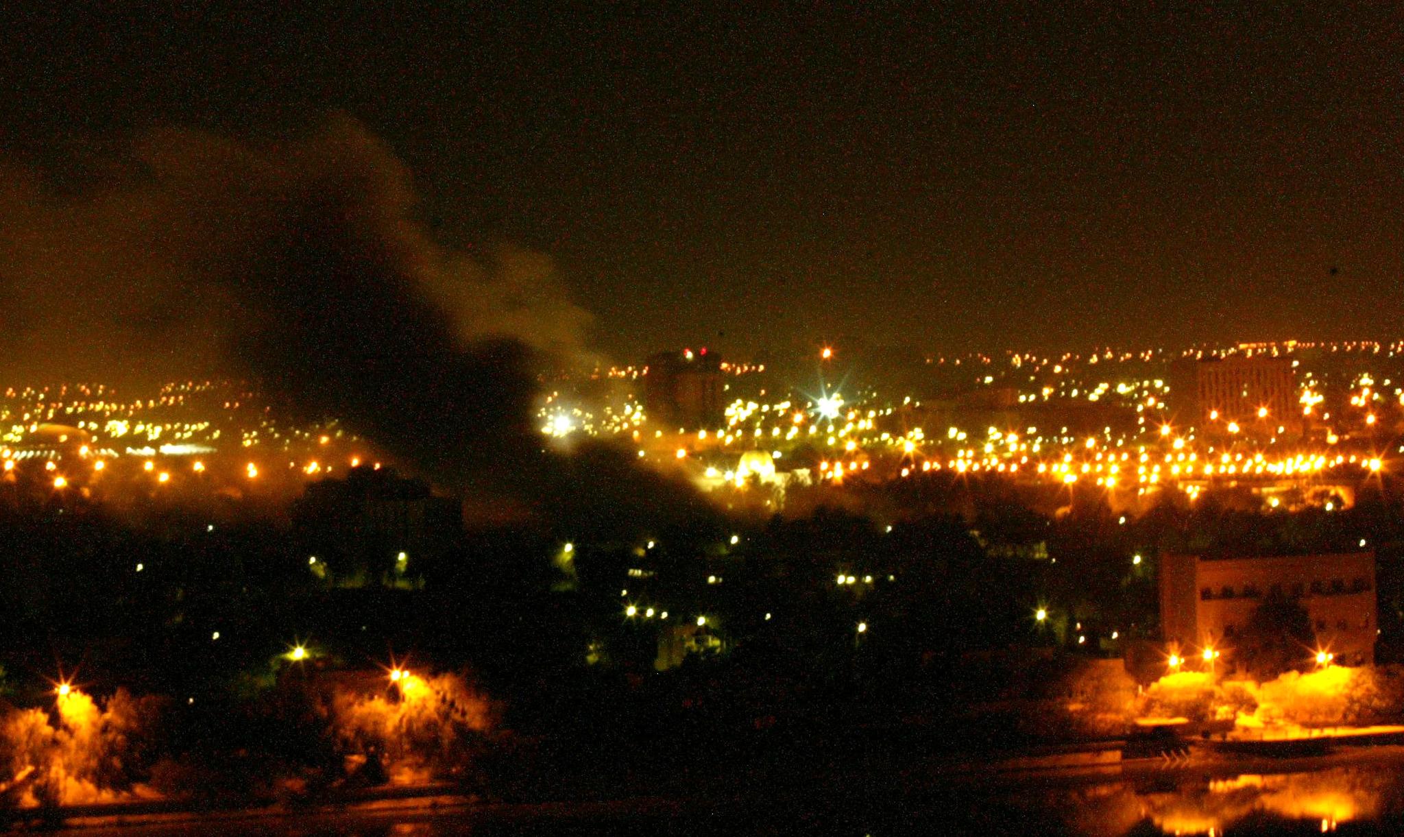 Smoke covers Baghdad on 20 March 2003